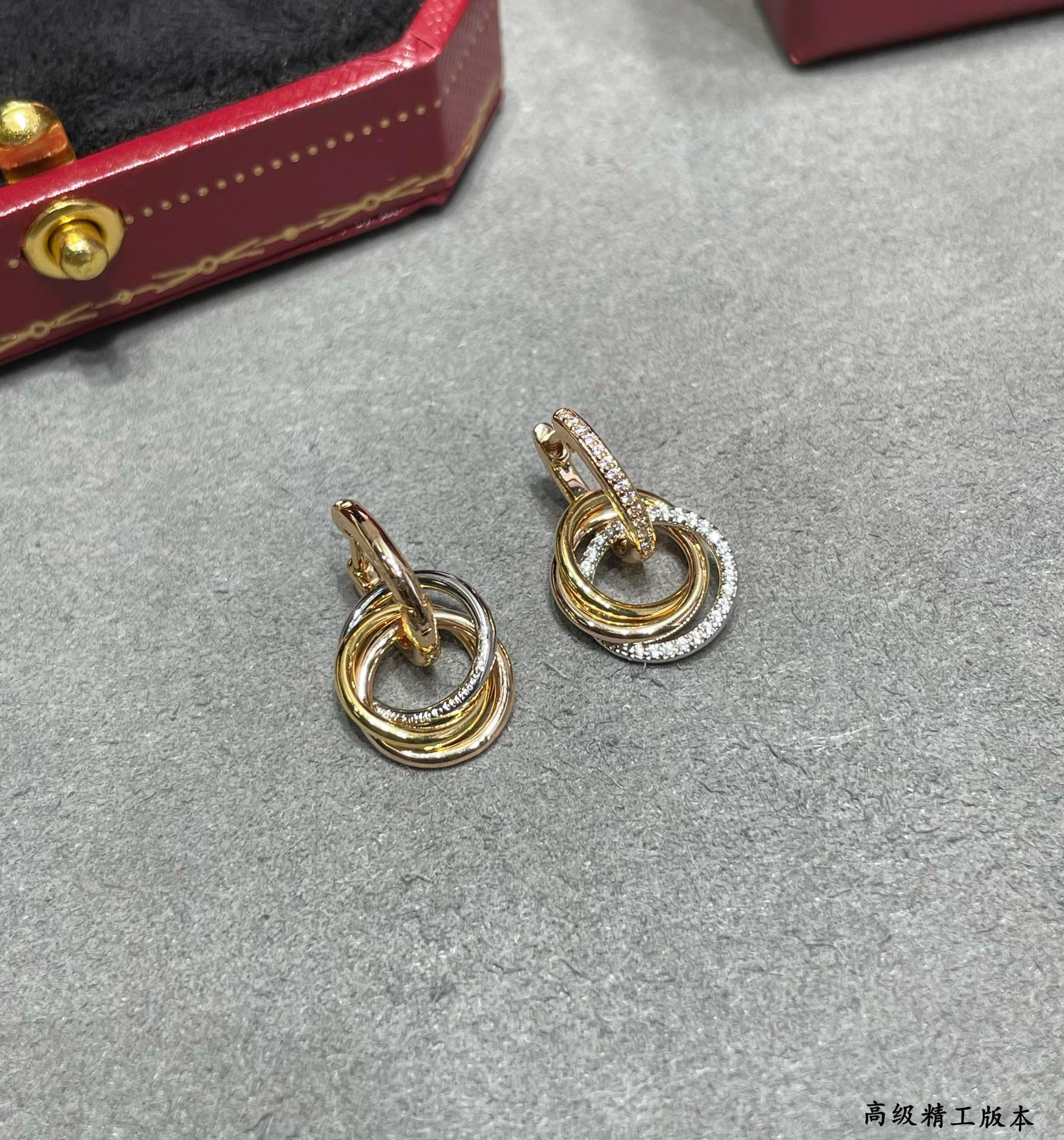ca*t*er small size triple-ring Di*m*nd earrings