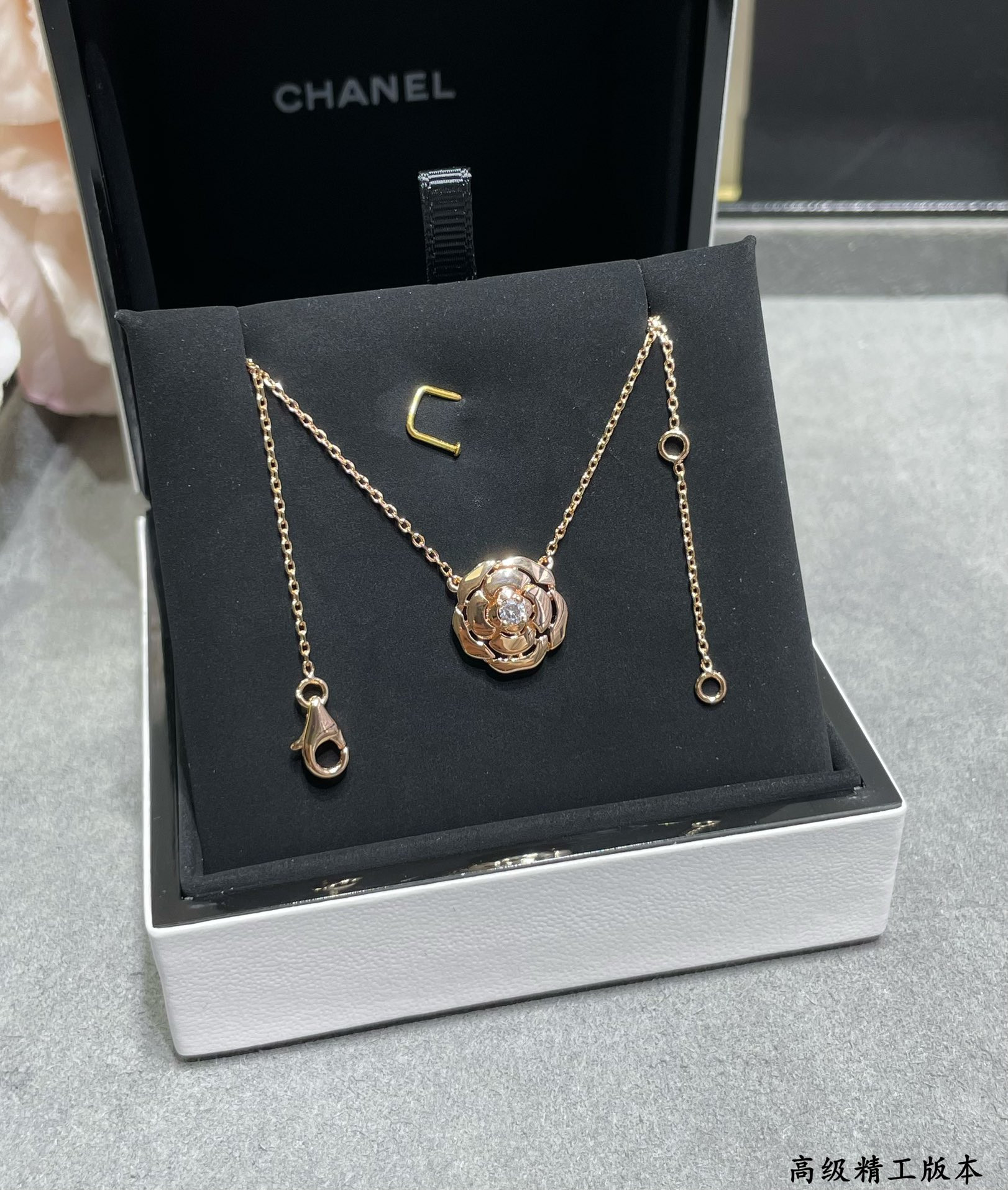 Ch*el camellia japonica necklace