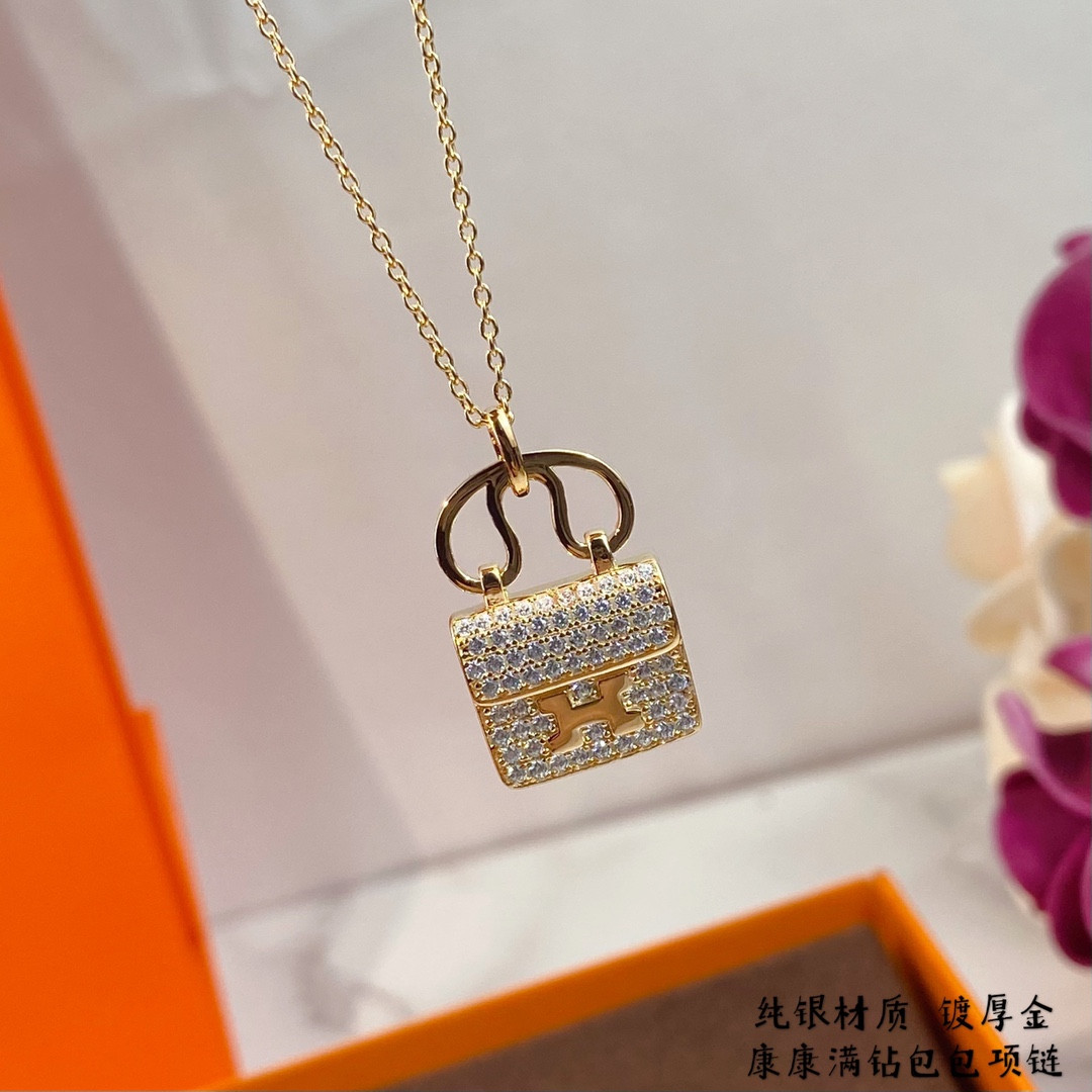 H**me5 fully di*m*nd-encrusted h bag necklace