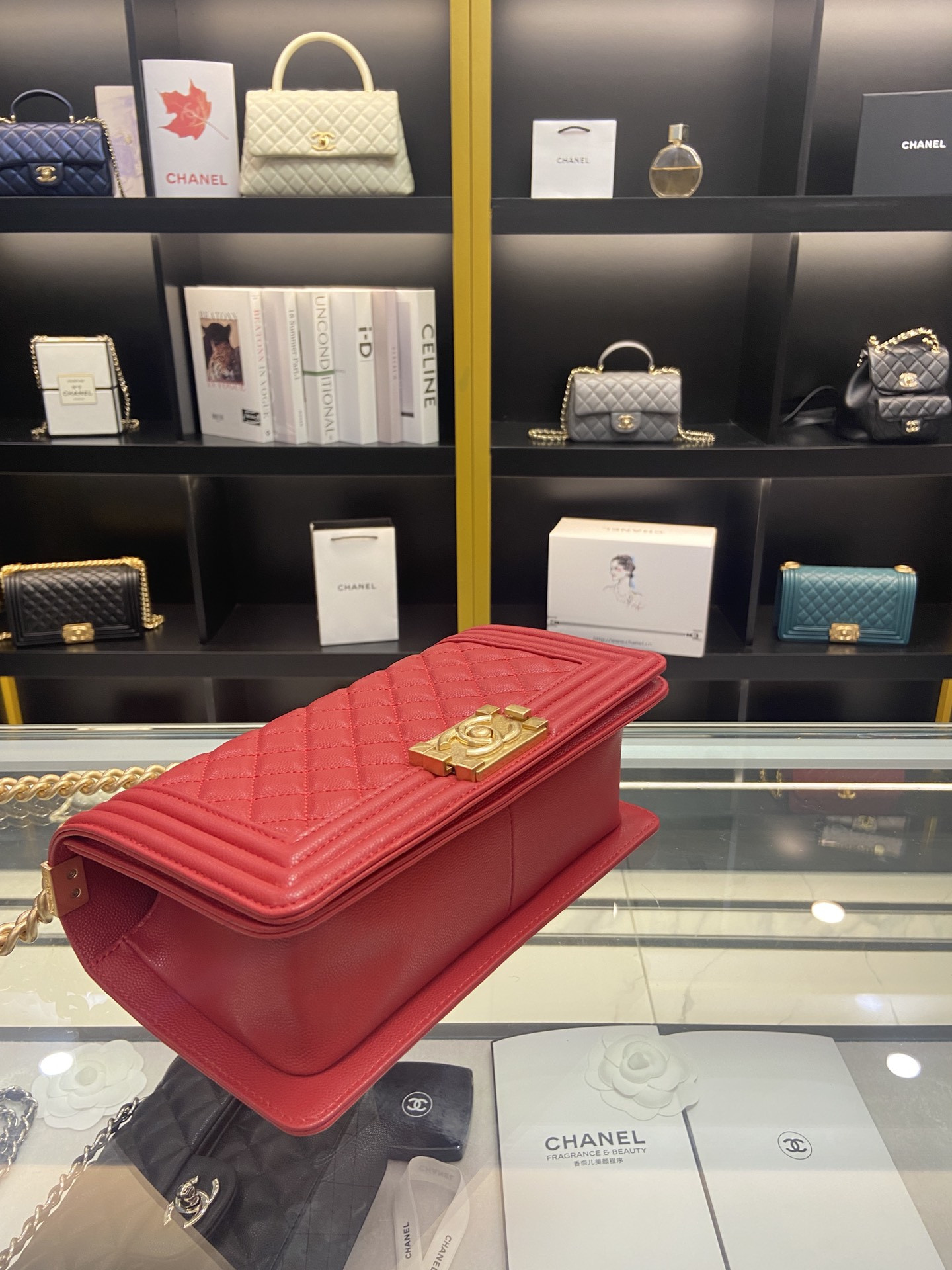 boy Ch*el handbag shiny red grained calfskin & gold-tone metal 5.9 × 9.8 × 3.5 in