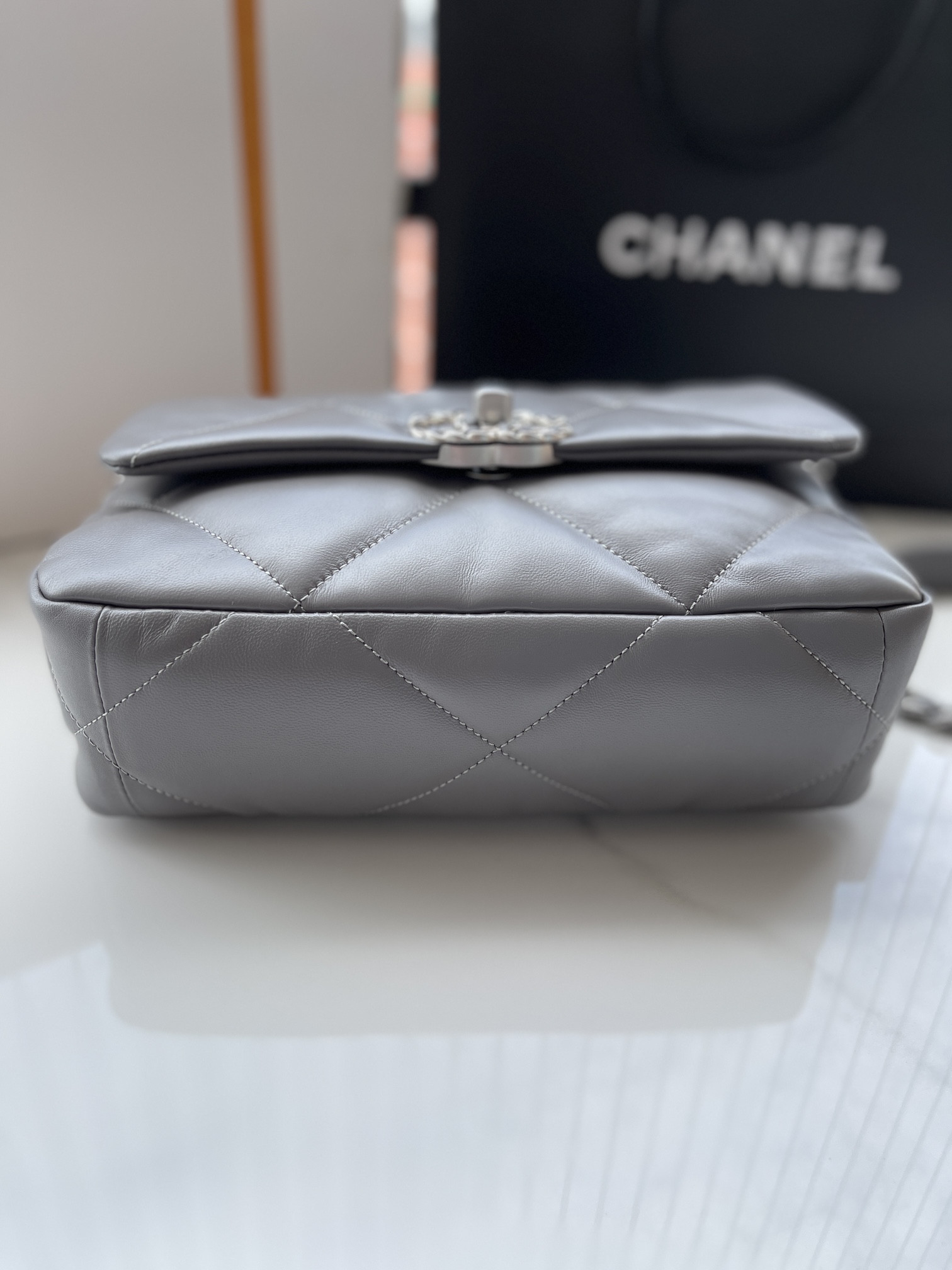 Ch*el 19 handbag shiny leather, gold-tone, silver-tone & ruthenium-finish metal dark gray 6.2 × 10.1 × 3.5 in