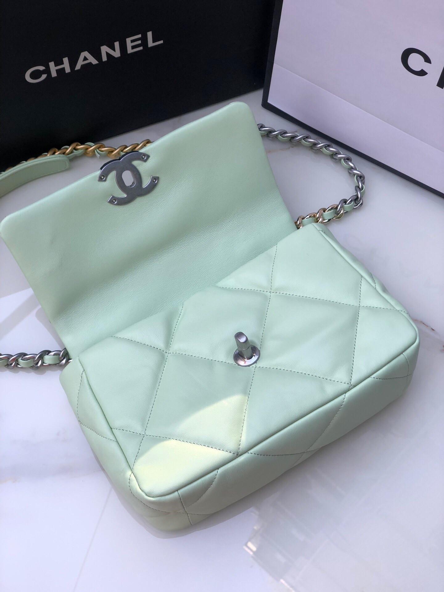 Ch*el 19 handbag shiny leather, gold-tone, silver-tone & ruthenium-finish metal green 6.2 × 10.1 × 3.5 in