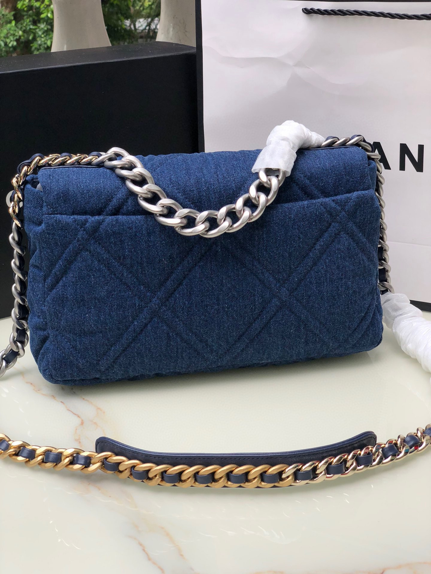 Ch*el 19 large handbag, gold-tone, silver-tone & ruthenium-finish metal blue 7.8 × 11.7 × 3.9 in