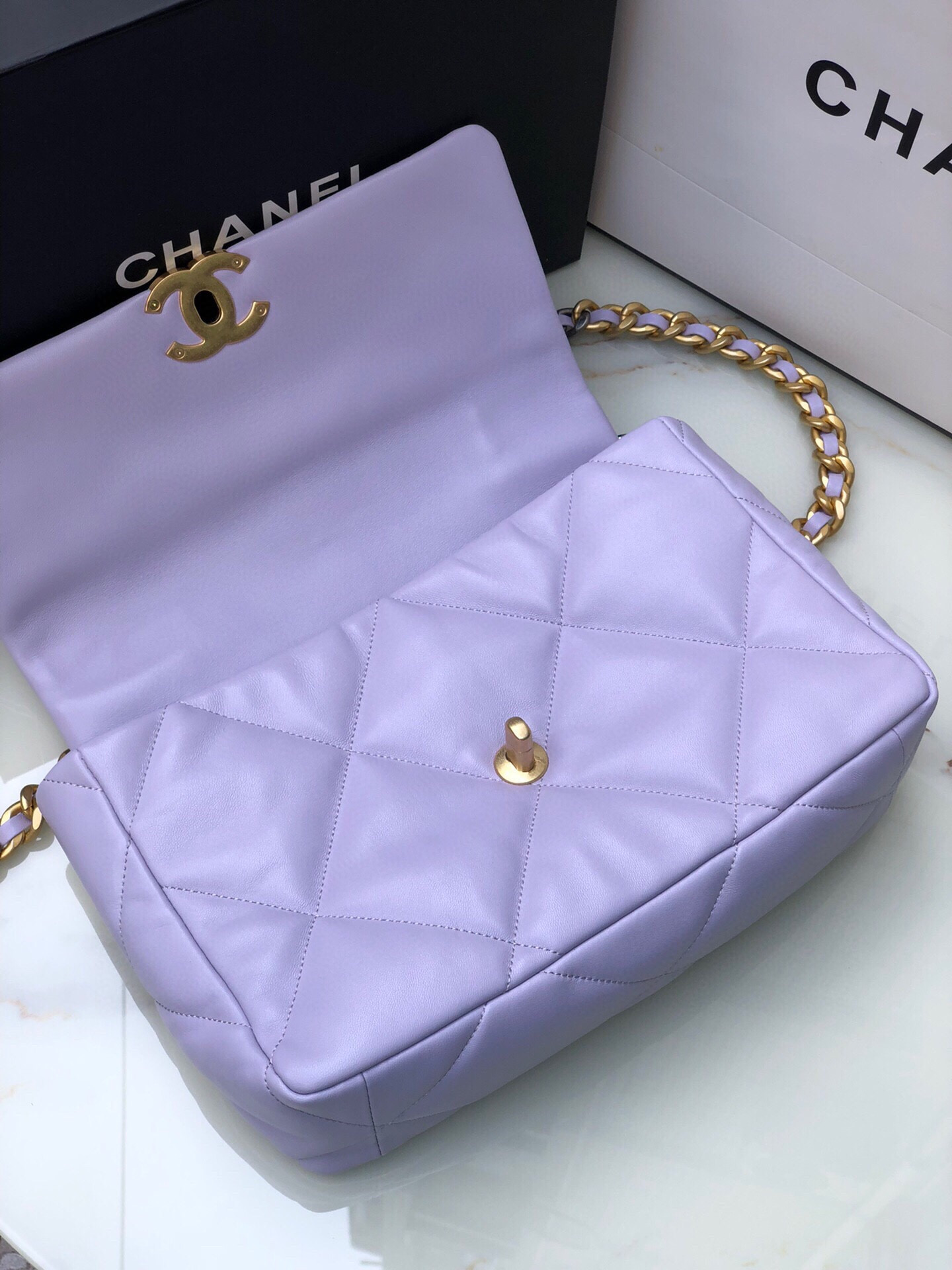 Ch*el 19 large handbag shiny leather, gold-tone, silver-tone & ruthenium-finish metal purple 7.8 × 11.7 × 3.9 in