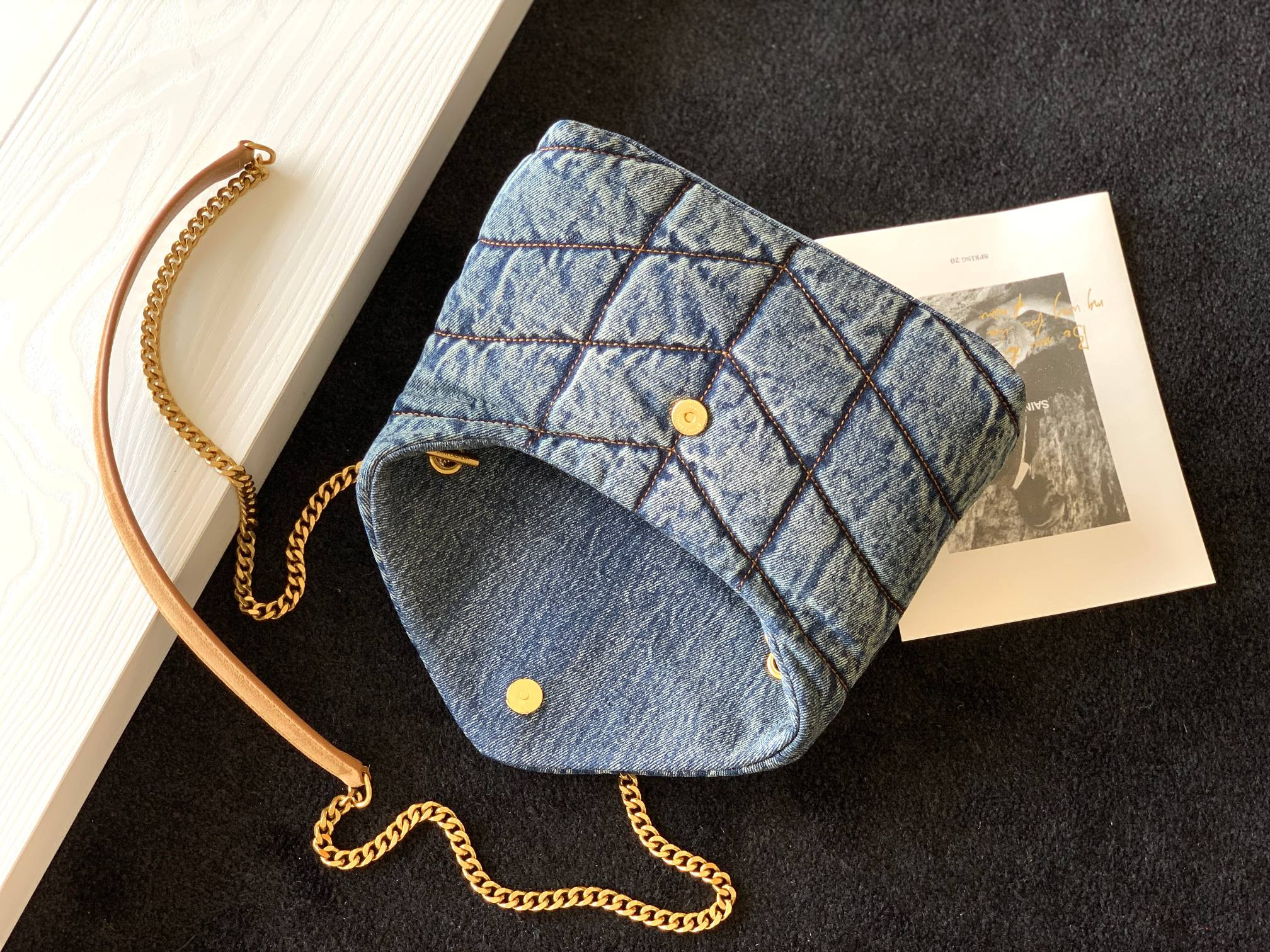 y*l puffer in suede and De*1m rodeo blue 23 x 15.5 x 5.8 cm