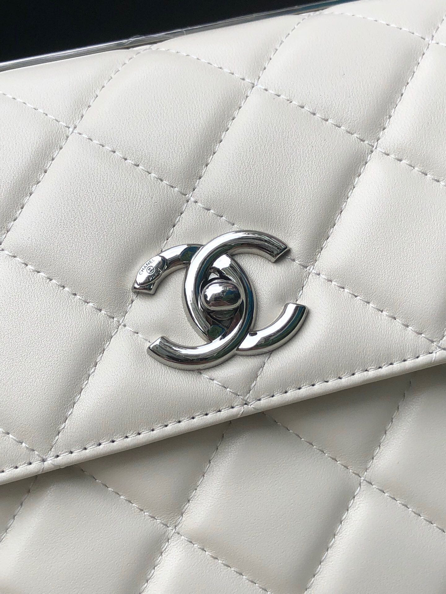 Ch*el flap bag with top handle 6.6 × 9.8 × 4.7 in