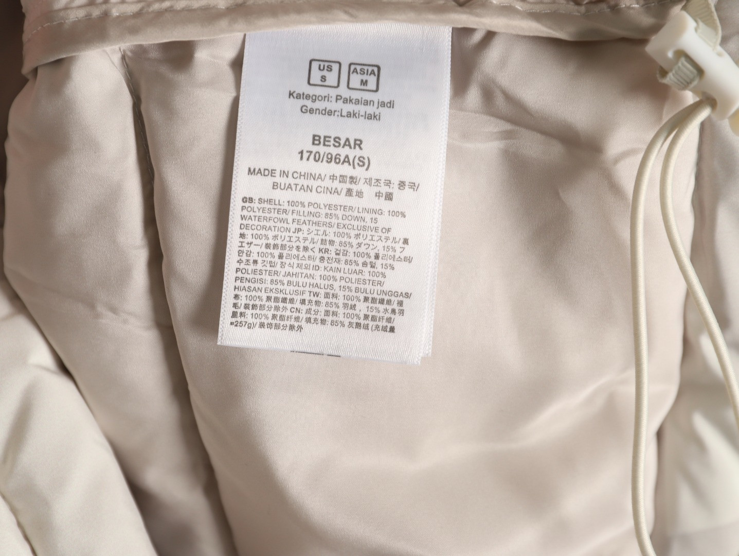 the n0r*h Fa*e x kaws short puffer jacket