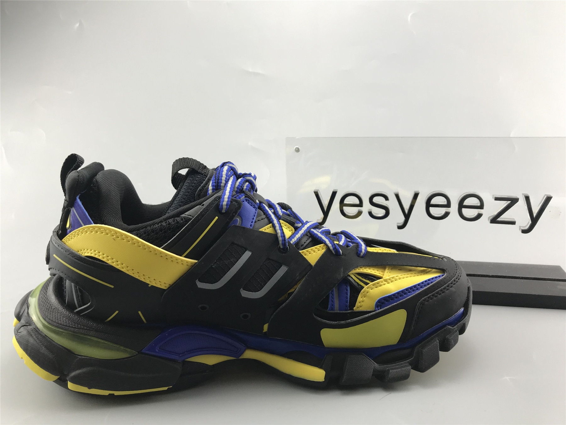 UA TRACK TRAINER BLACK YELLOW BLUE