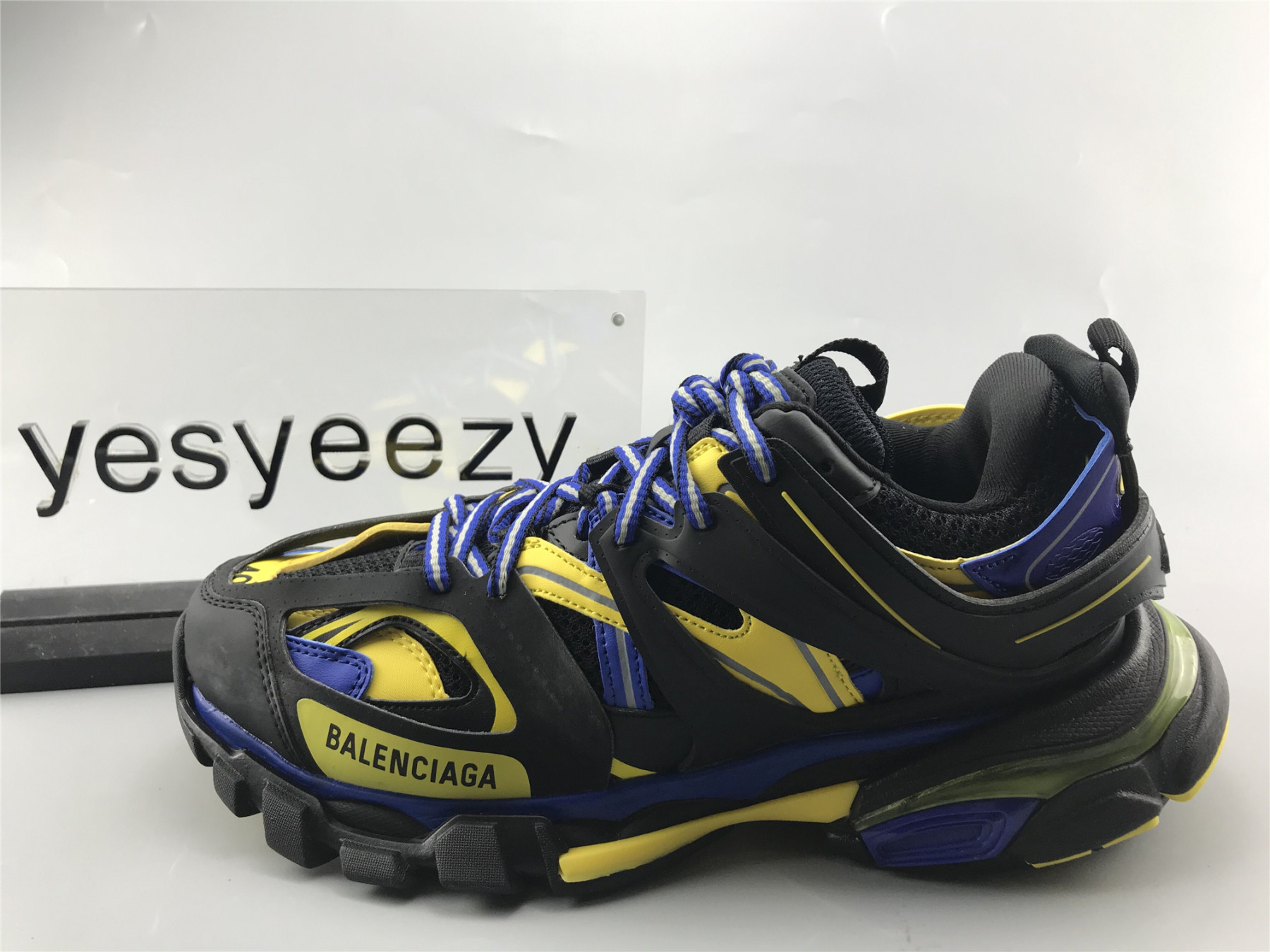 UA TRACK TRAINER BLACK YELLOW BLUE