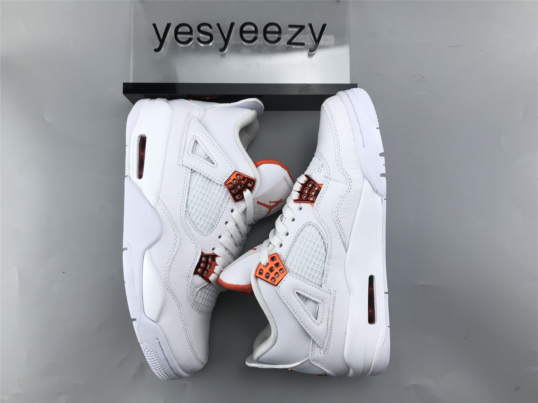 UA AIR JORDAN 4 RETRO METALLIC ORANGE