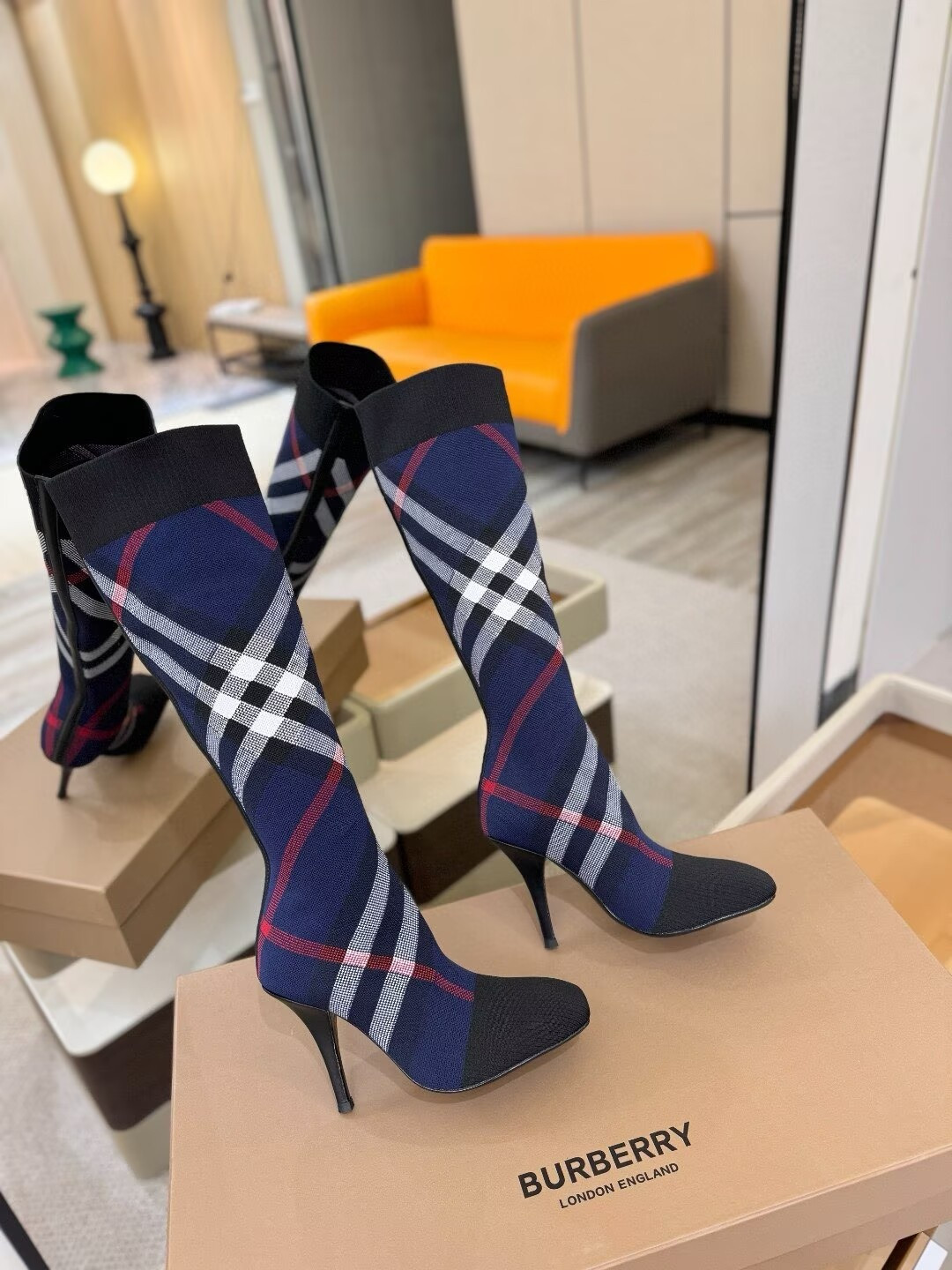 ua Bv*b*rry check high boots