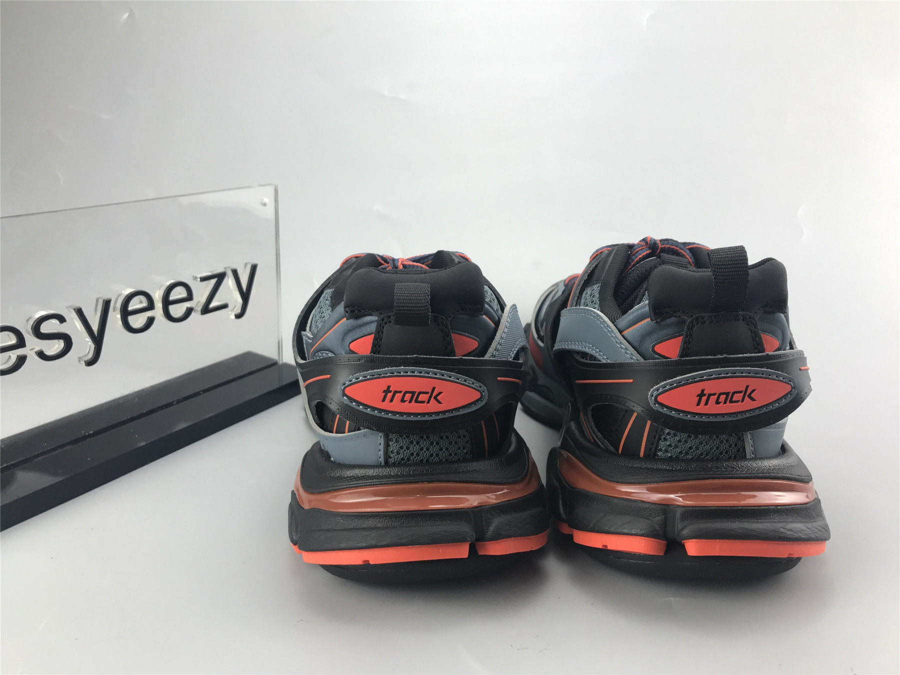 UA TRACK TRAINER BLACK BLUE GREY ORANGE