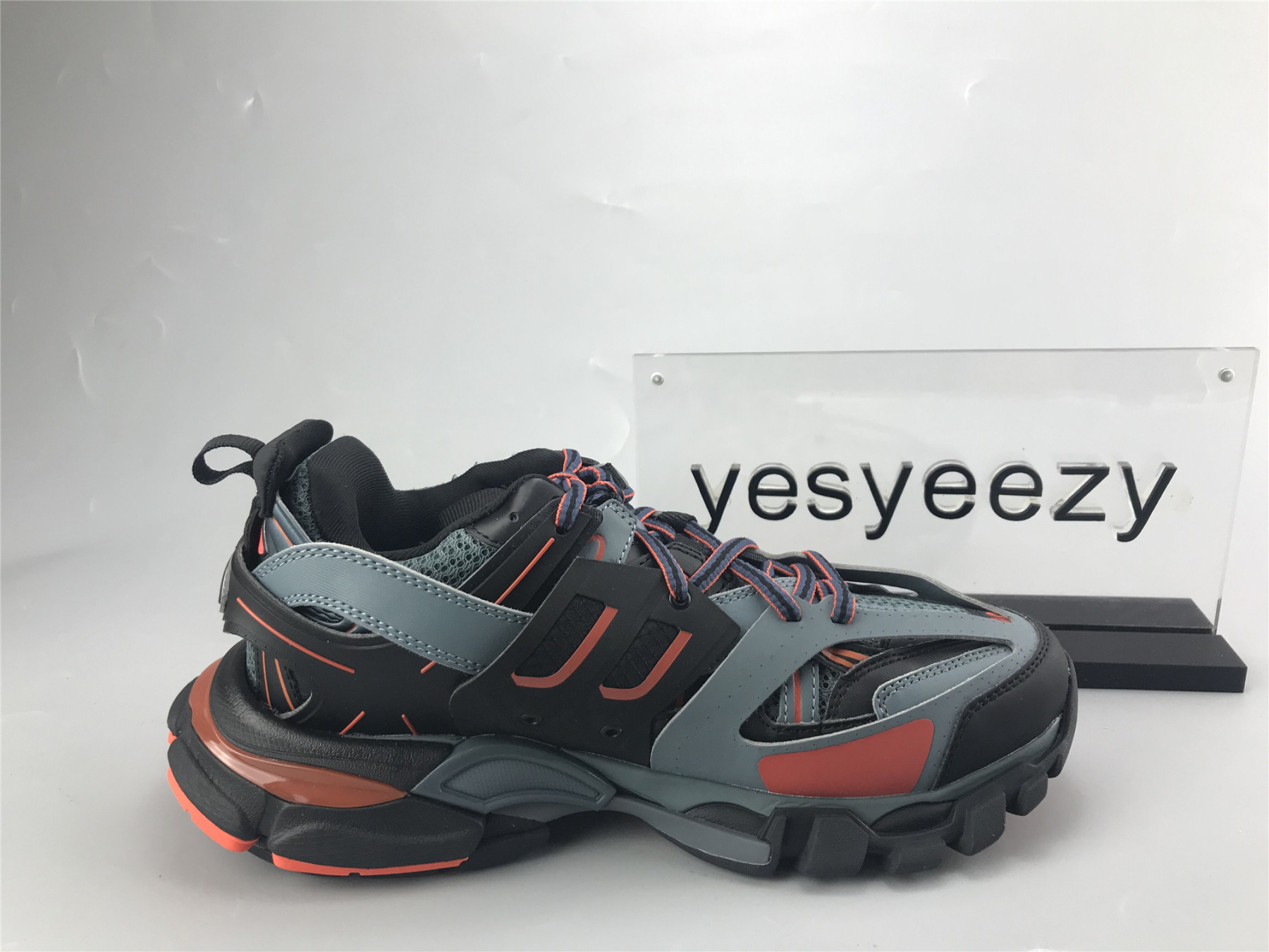 UA TRACK TRAINER BLACK BLUE GREY ORANGE