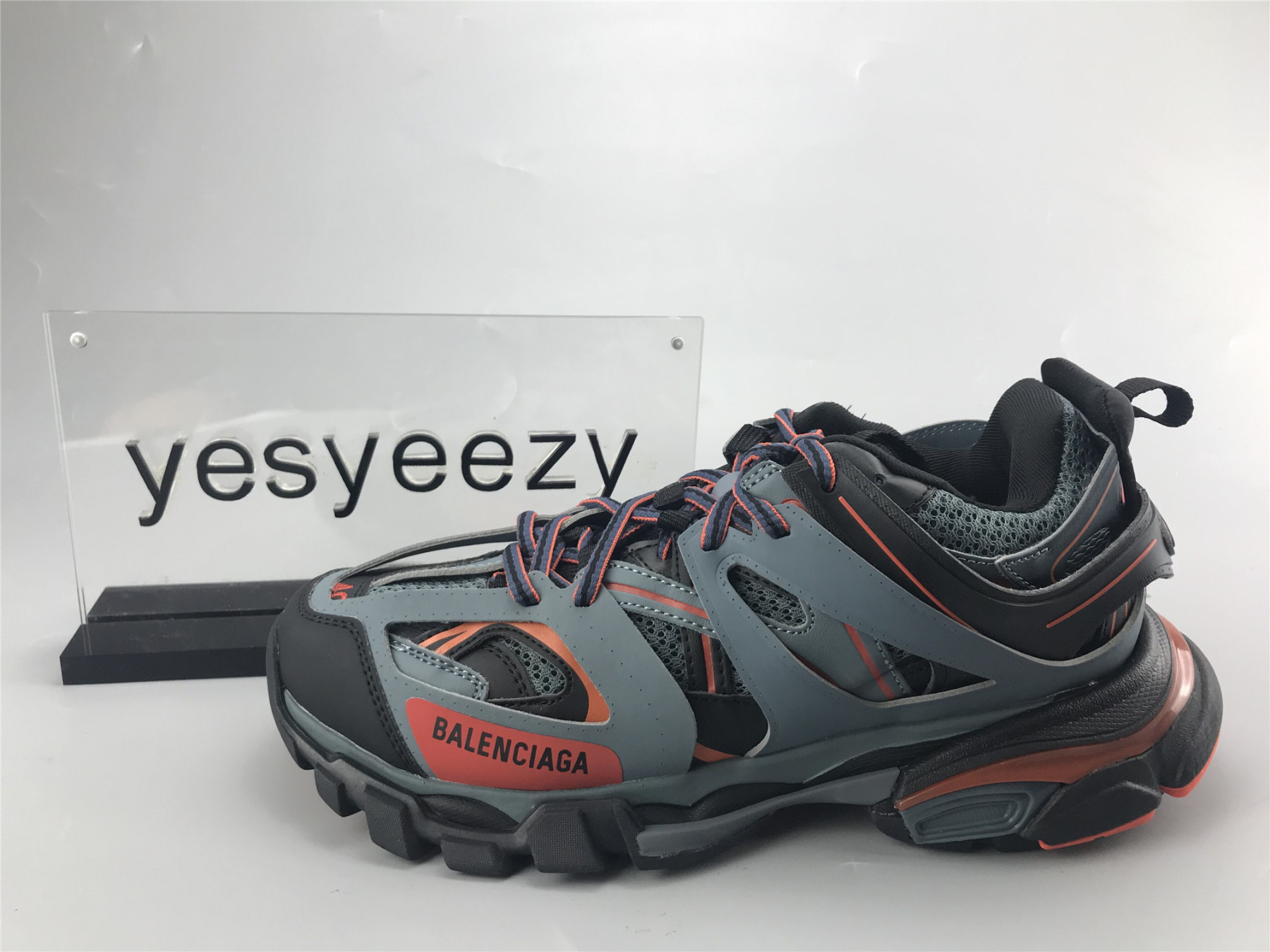 UA TRACK TRAINER BLACK BLUE GREY ORANGE