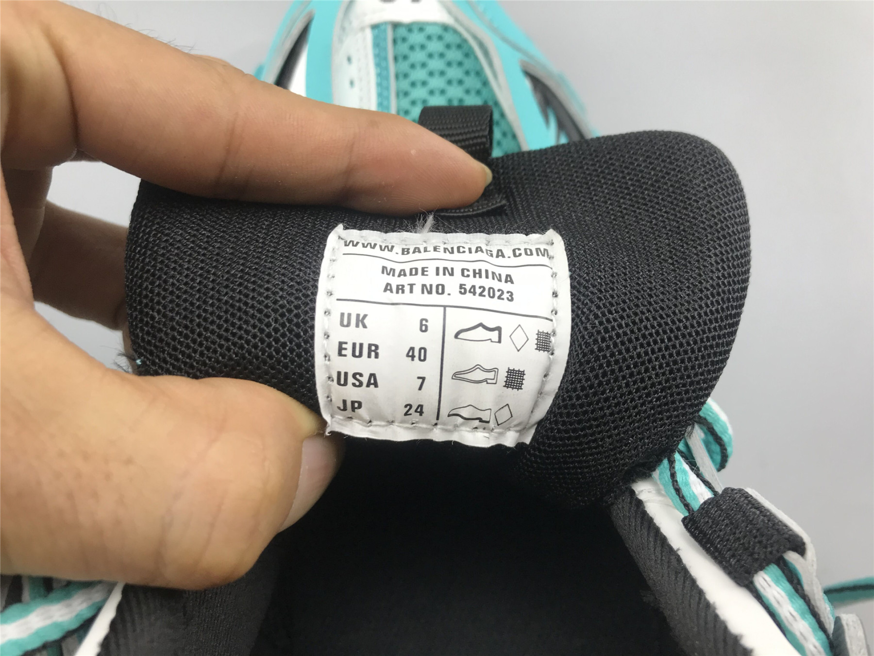 UA TRACK TRAINER EMERALD BLUE