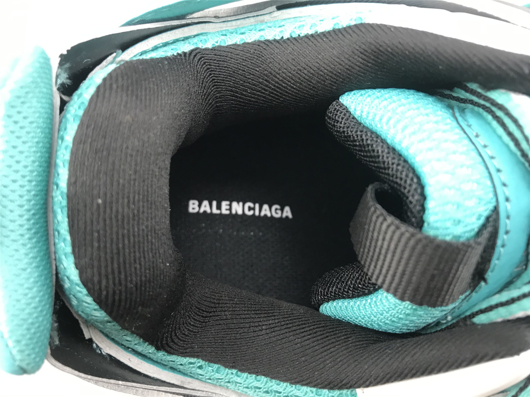 UA TRACK TRAINER EMERALD BLUE