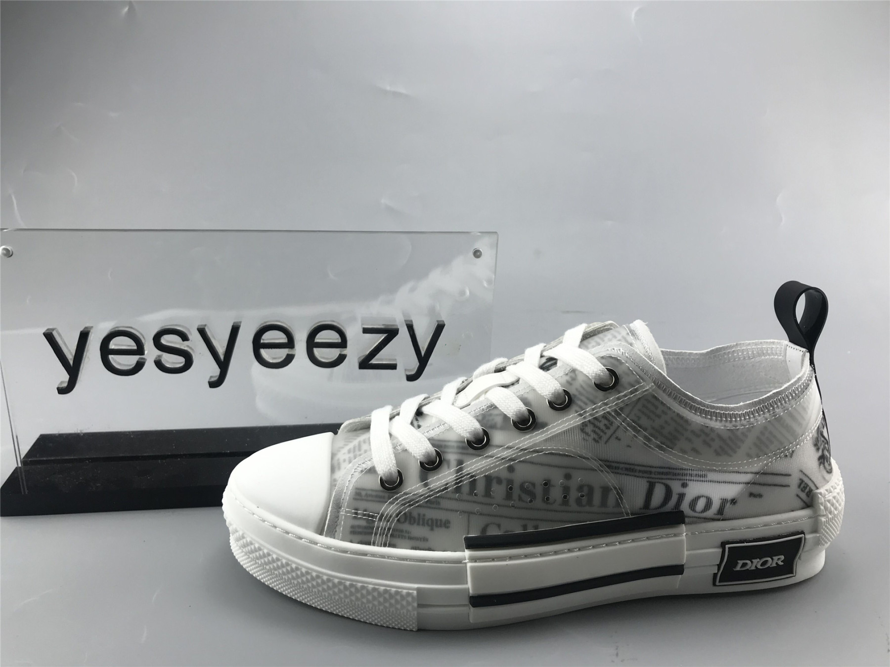 ua D10r b23 low top daniel asham newspaper