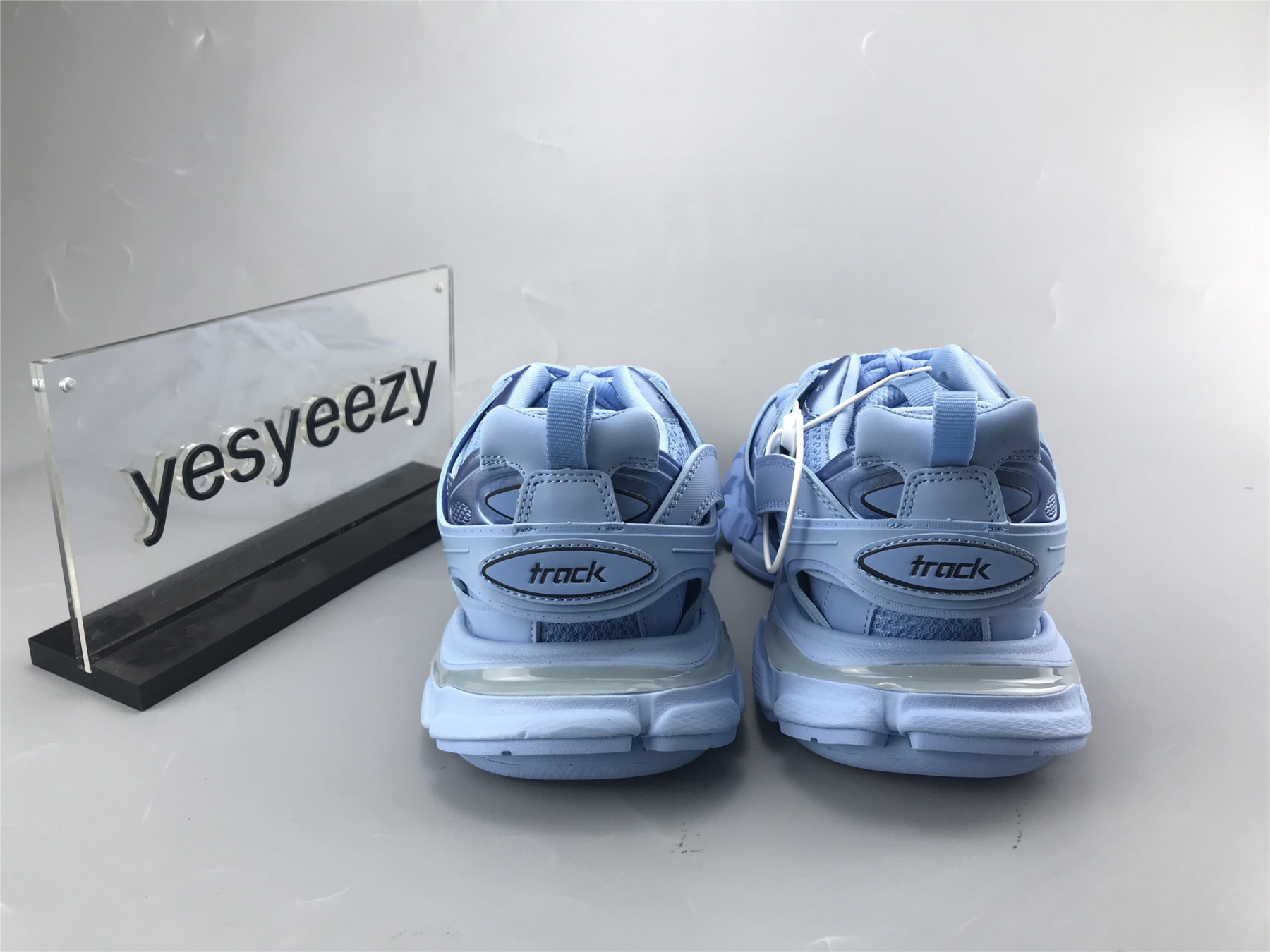 UA TRACK TRAINER LIGHT BLUE WITH LED LIGHTS