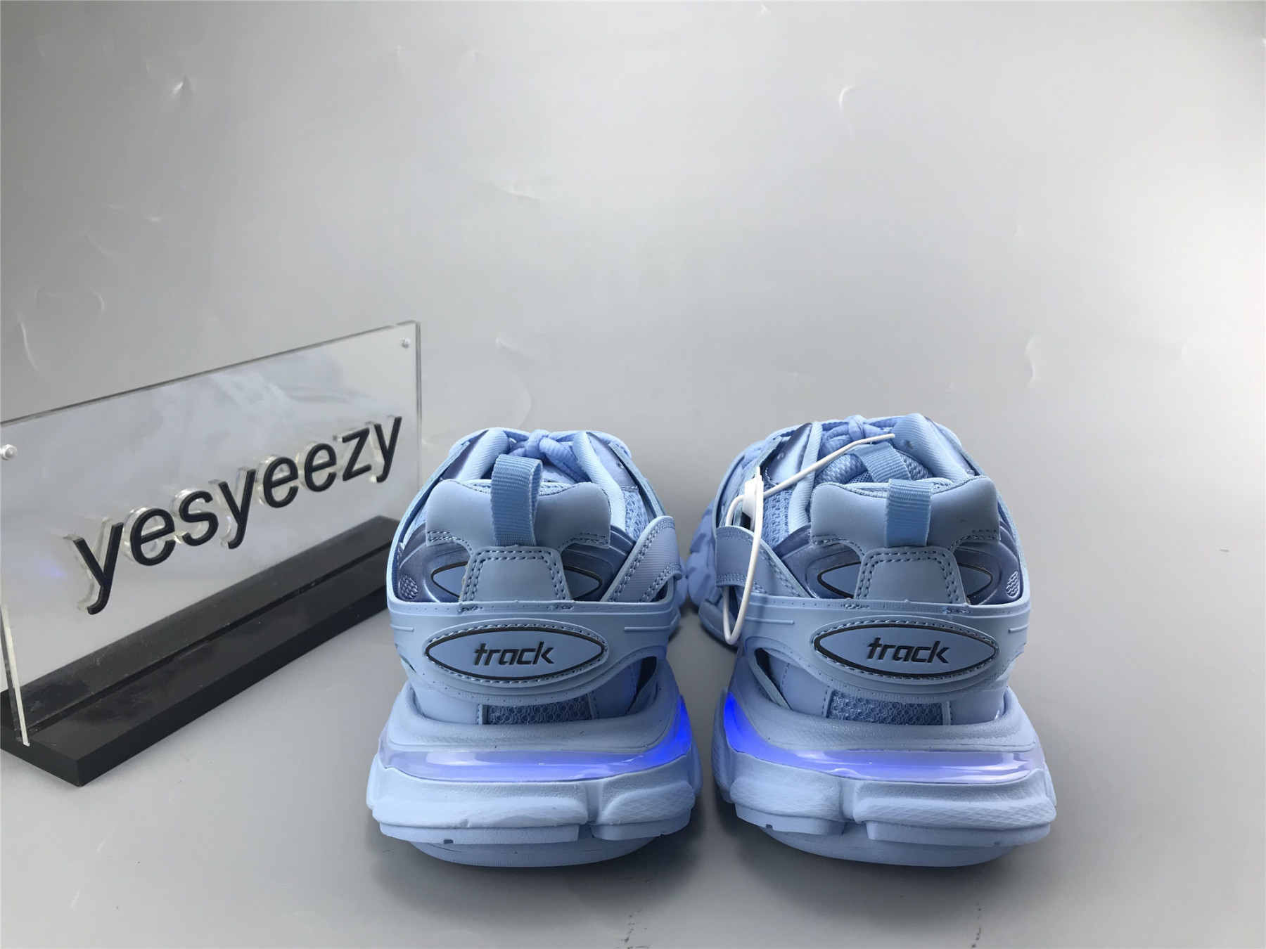 UA TRACK TRAINER LIGHT BLUE WITH LED LIGHTS