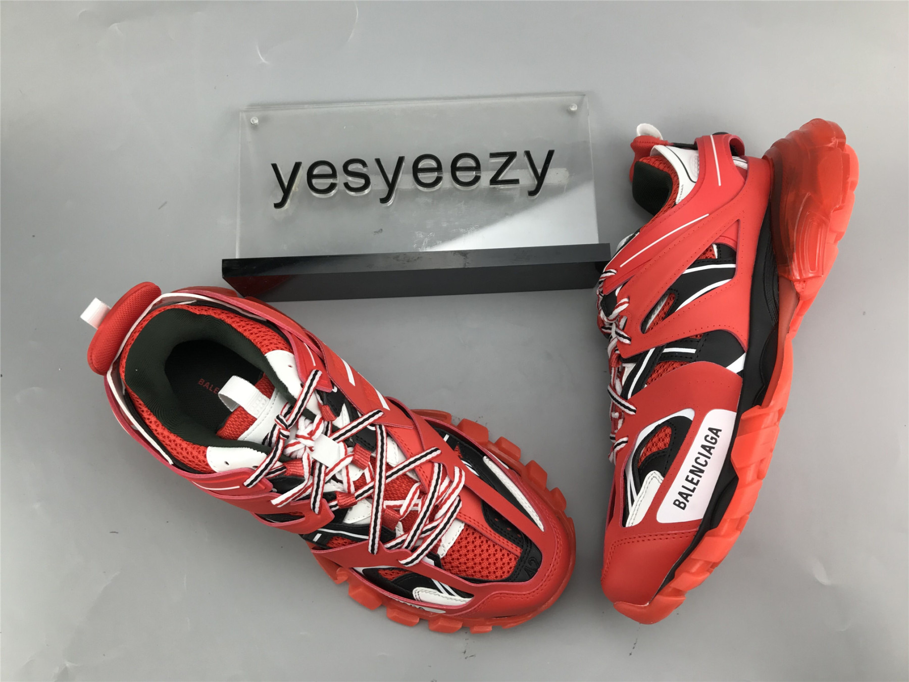 UA TRACK TRAINER RED TRANSPARENT SNEAKER