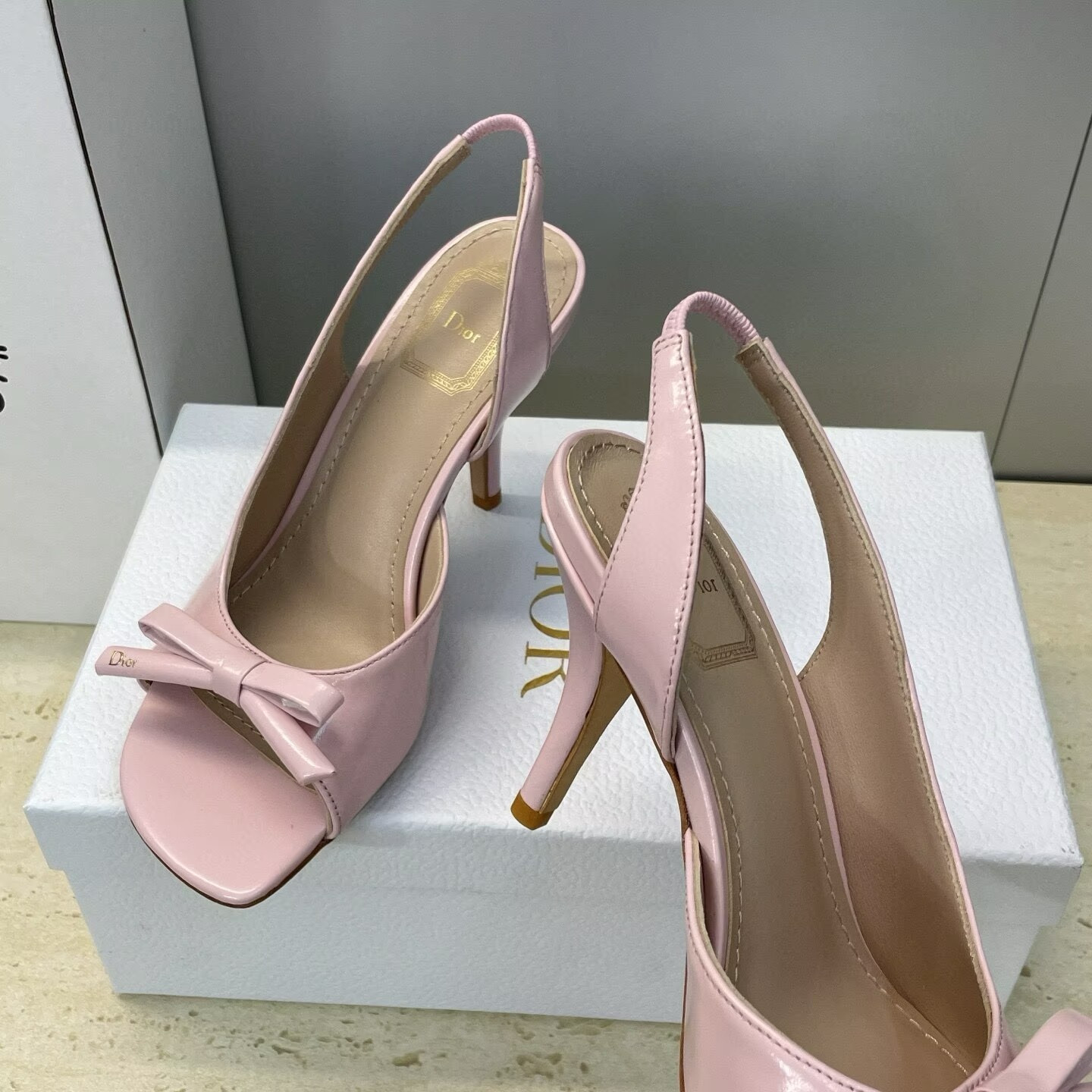 ua D10r bow heeled slingback sandal
