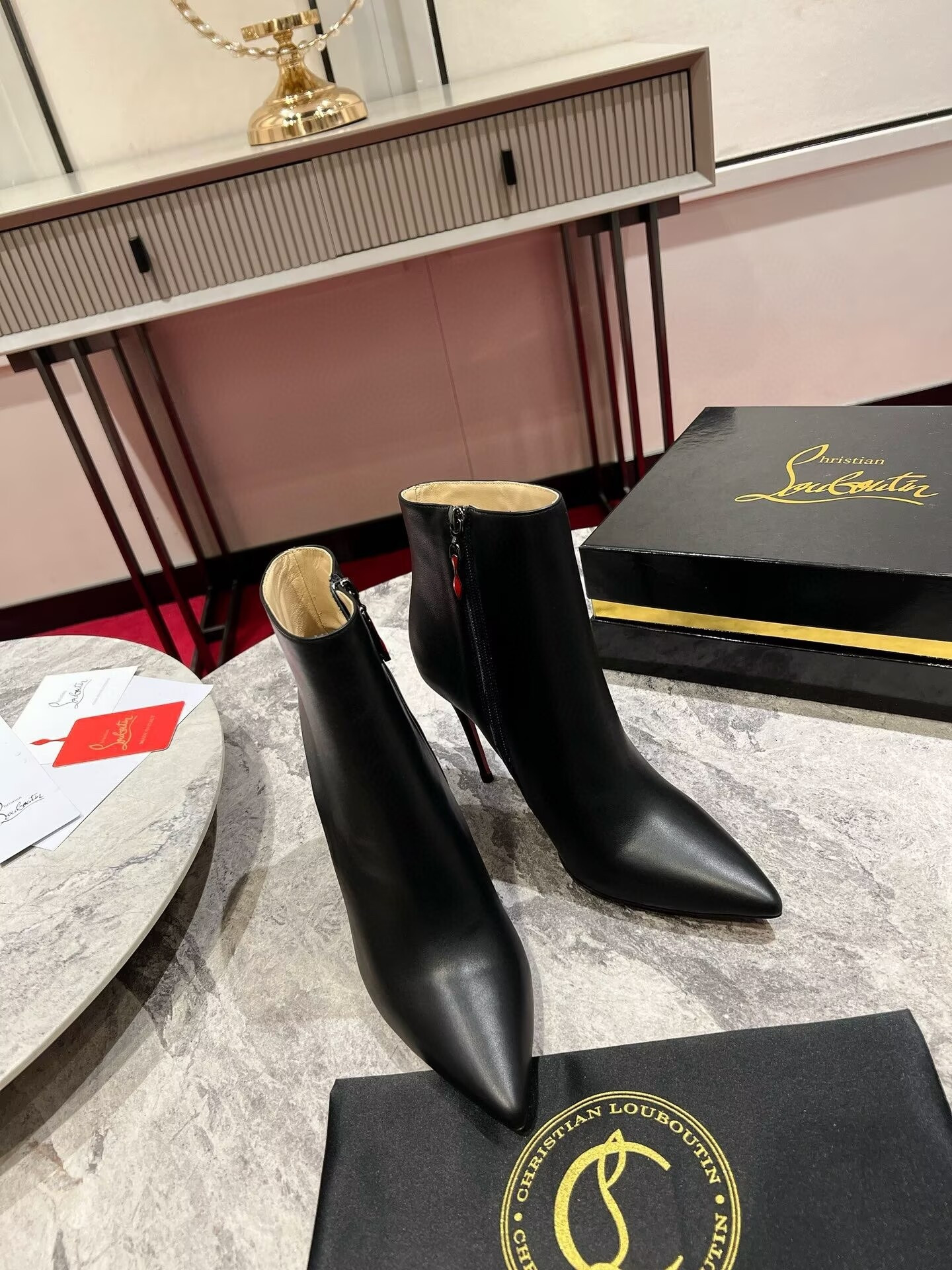 UA Chr1st1an Louboutin Miss Z Booty 100 mm Low Boots Calf leather Black