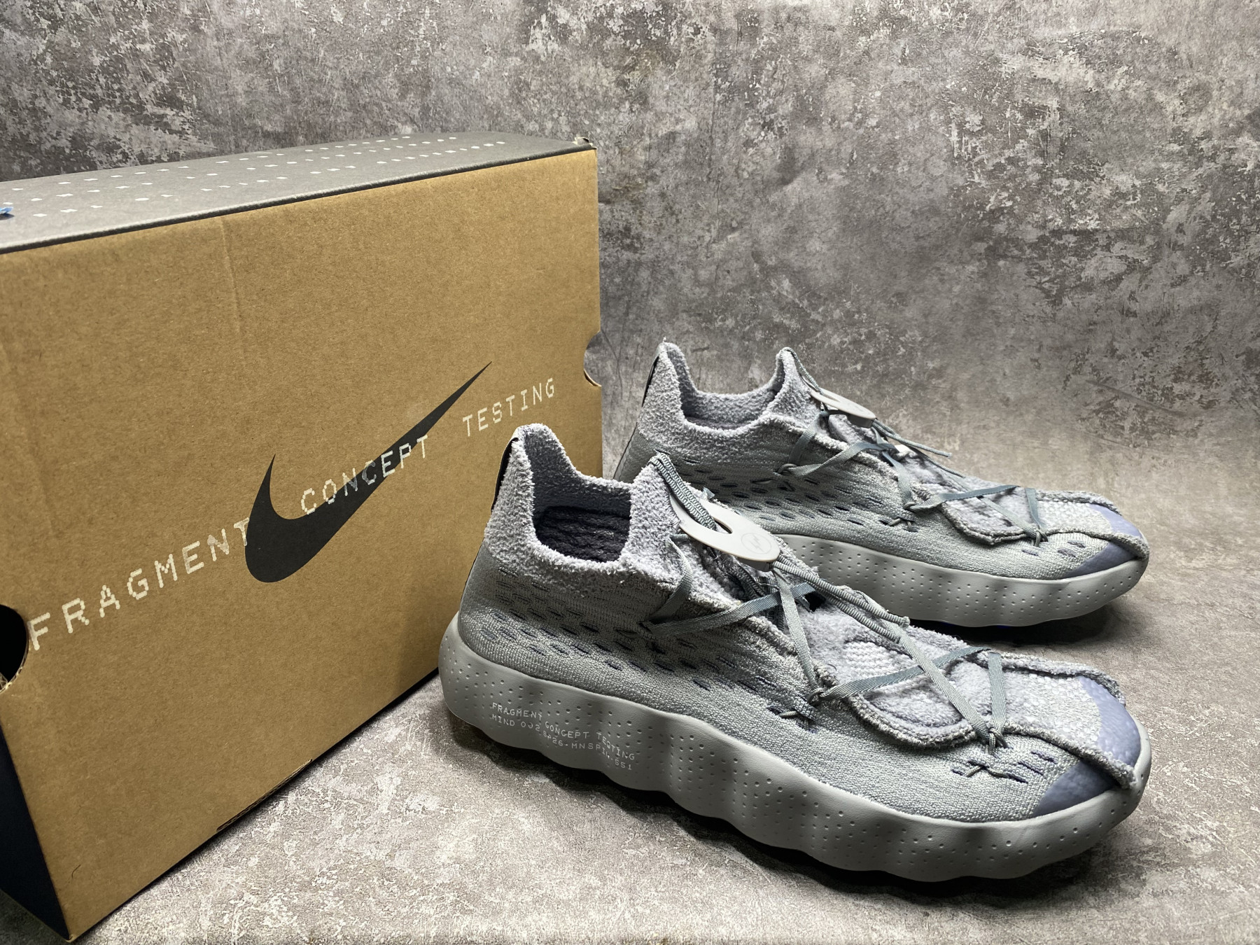 UA Nike Mind 002 Flyknit