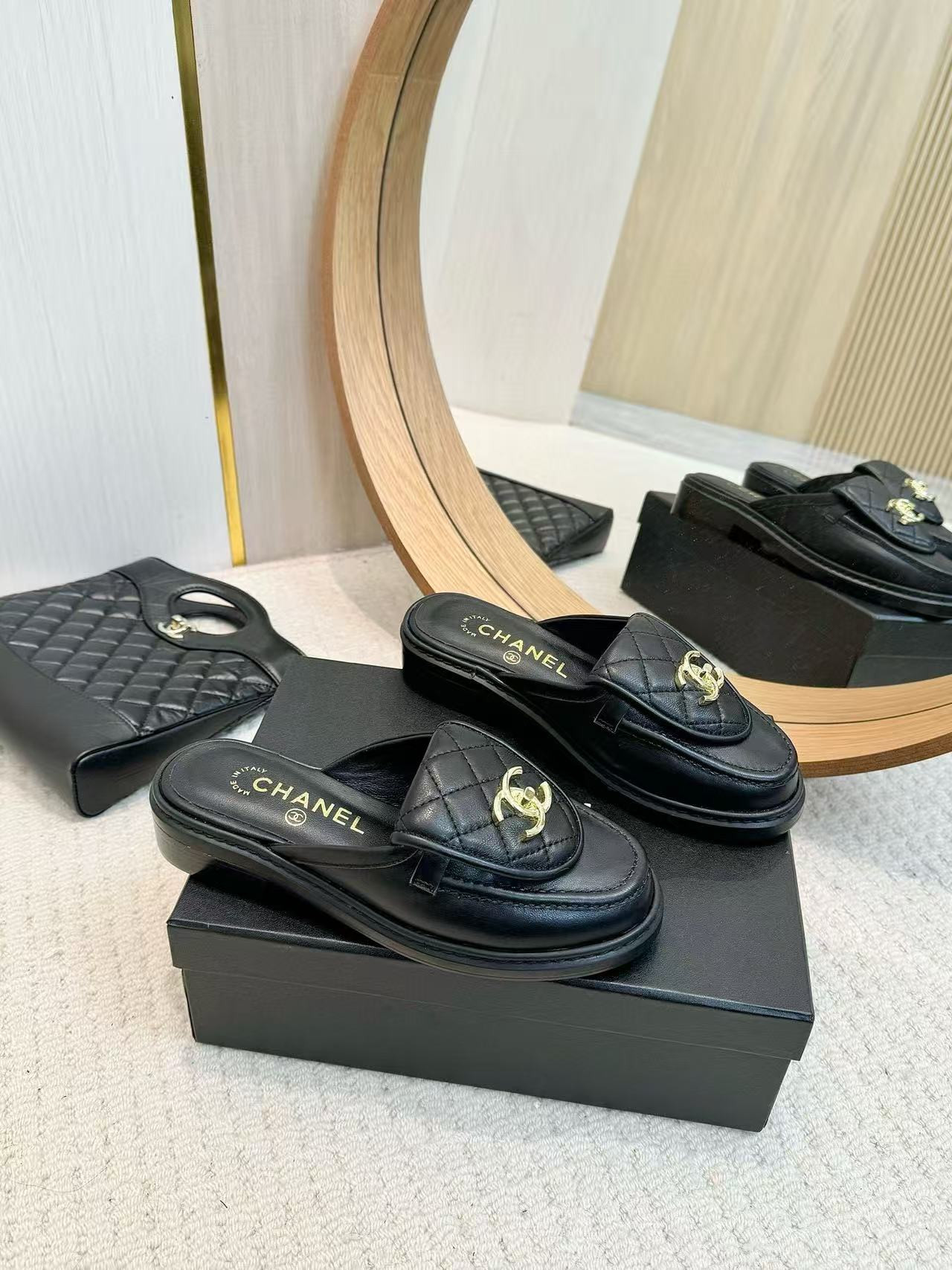 UA Ch**el Slides Leather Flats