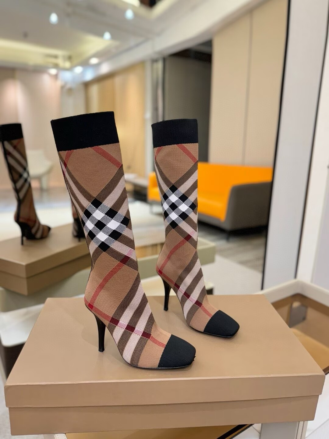 ua Bv*b*rry check high boots