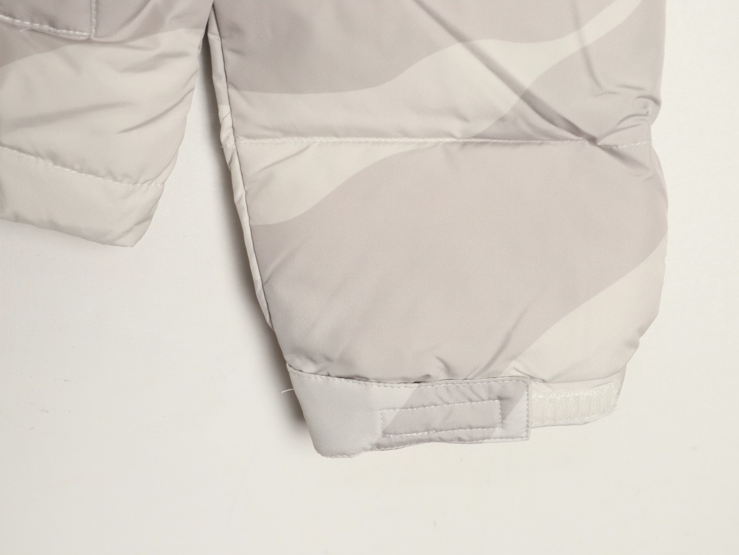 the n0r*h Fa*e x kaws short puffer jacket