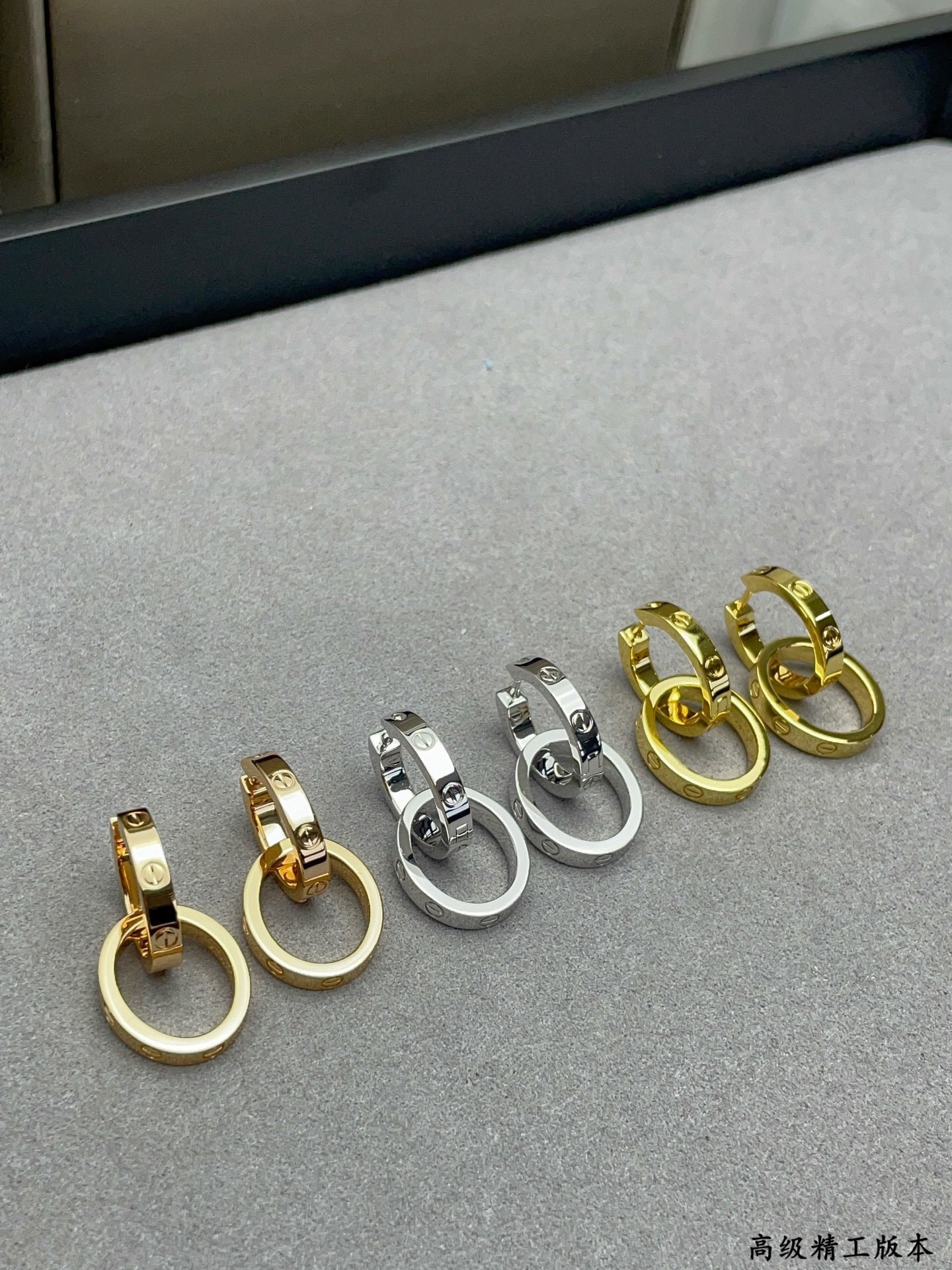 Ca*t1er Double Ring Polished Earrings
