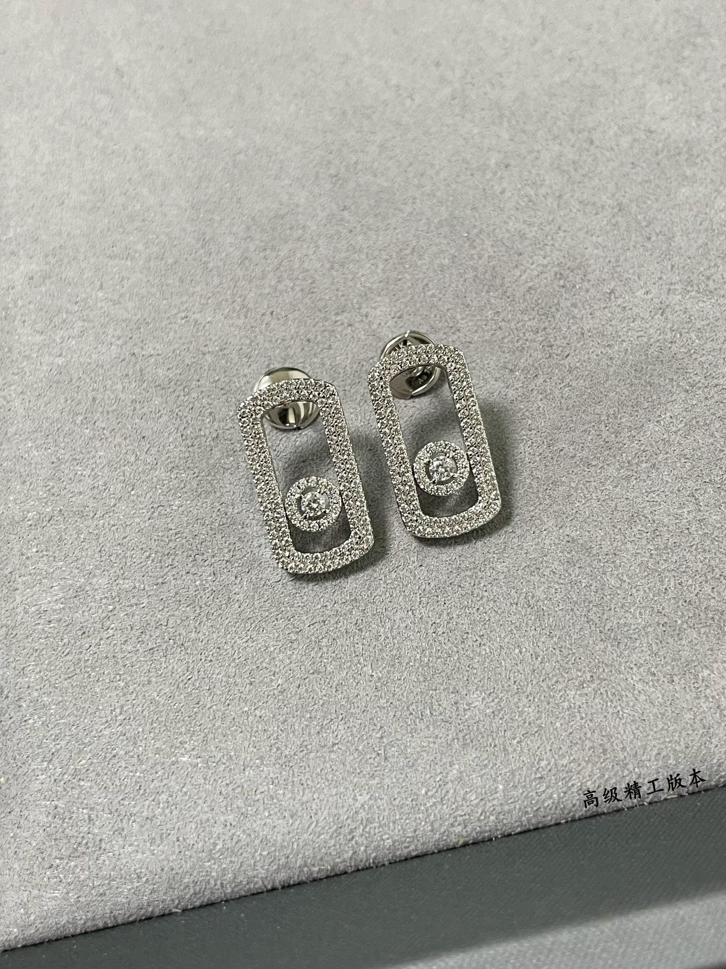 Mes1kaa large full d1am0nd moving stud earrings