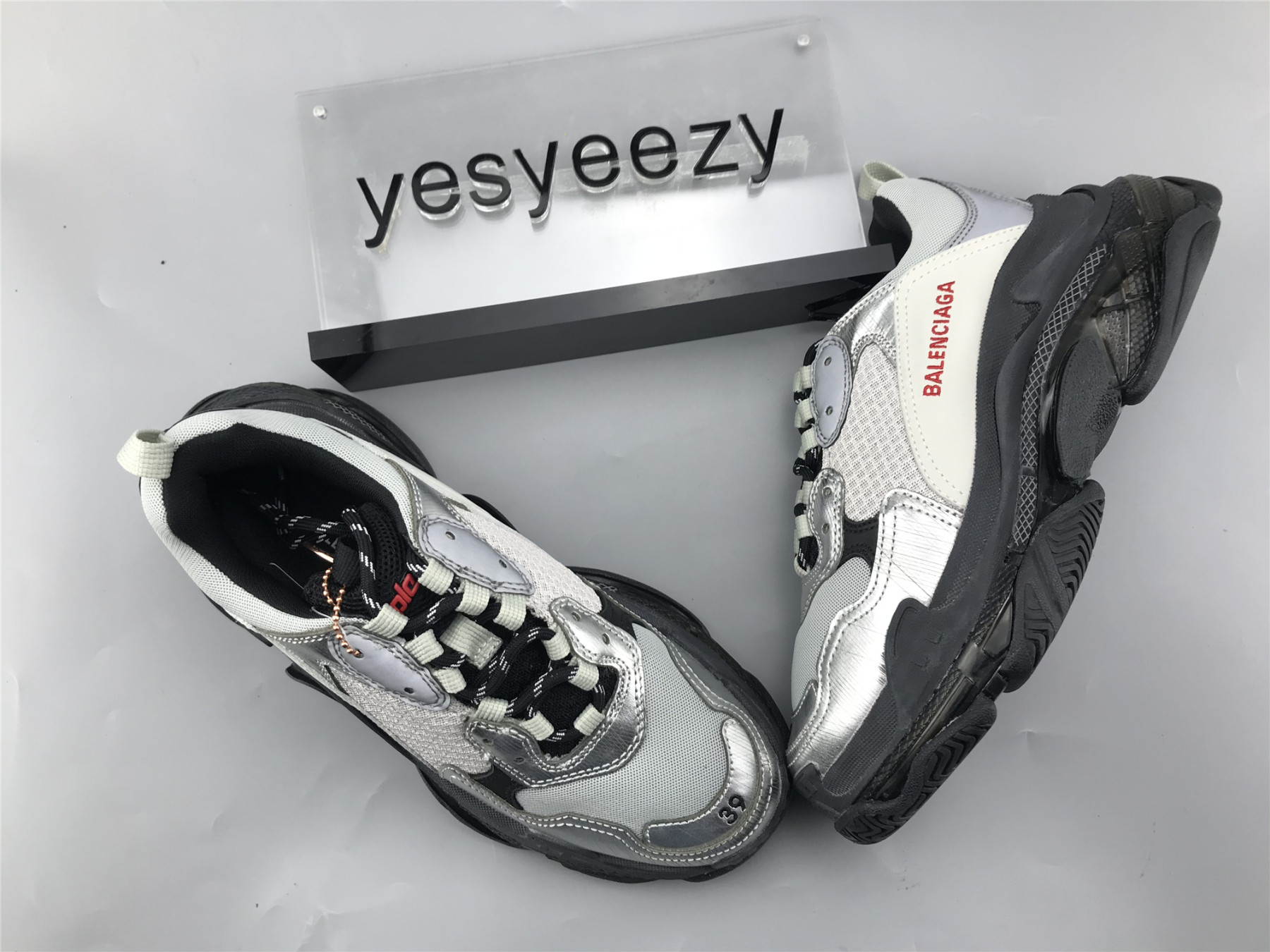 UA TRIPLE S SNEAKER BLACK AND SLIVER