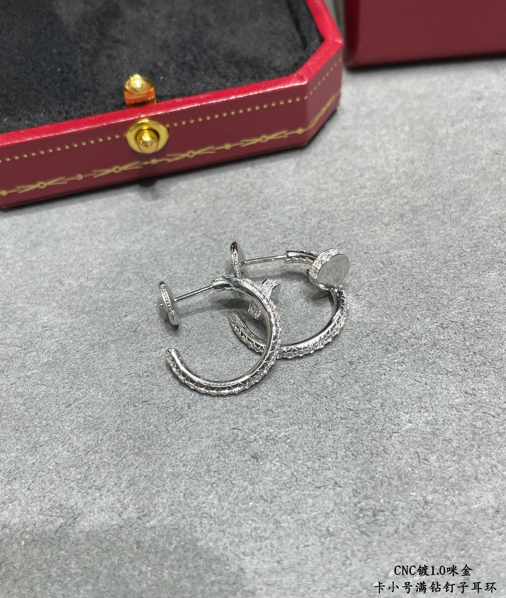 Ca*t1er Fully D1am0nd-encrusted small nail Earrings