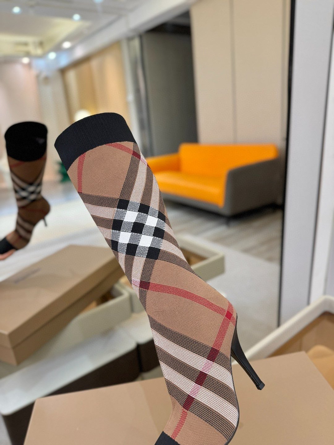 ua Bv*b*rry check high boots