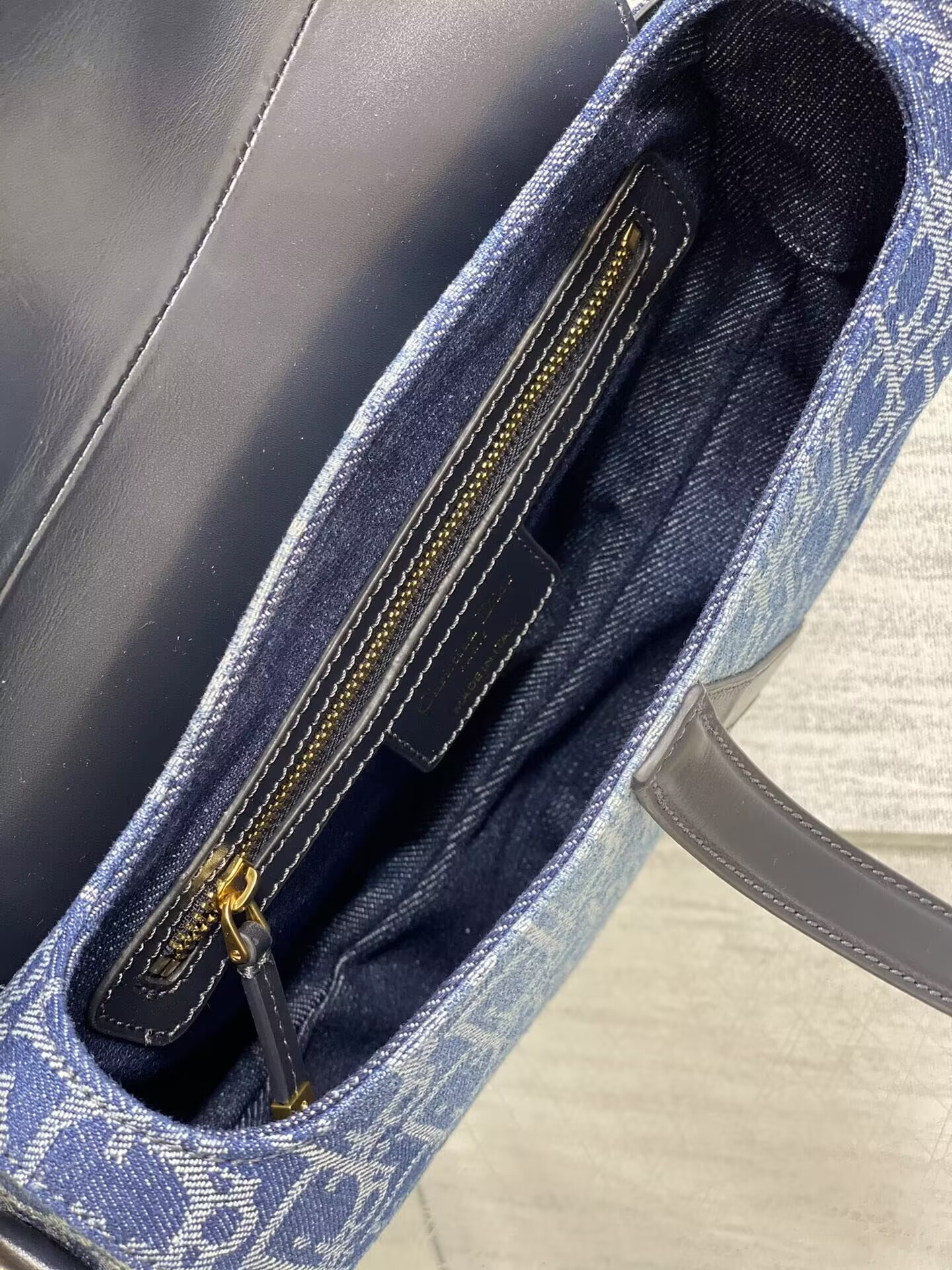 d10r saddle bag with strap  blue De*1m d10r oblique jacquard 25.5 x 20 x 6.5 cm