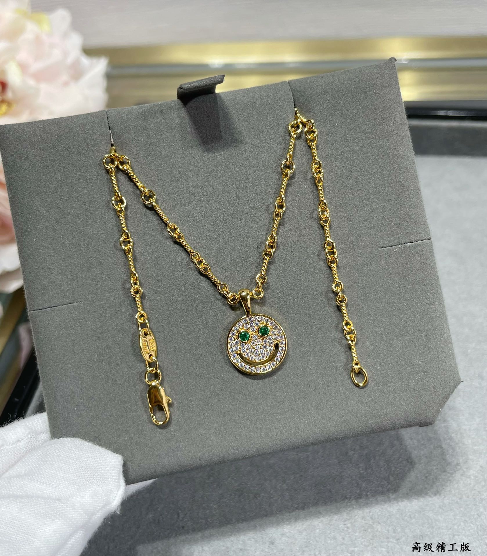 ch*0me he**ts round smiley Fa*e necklace