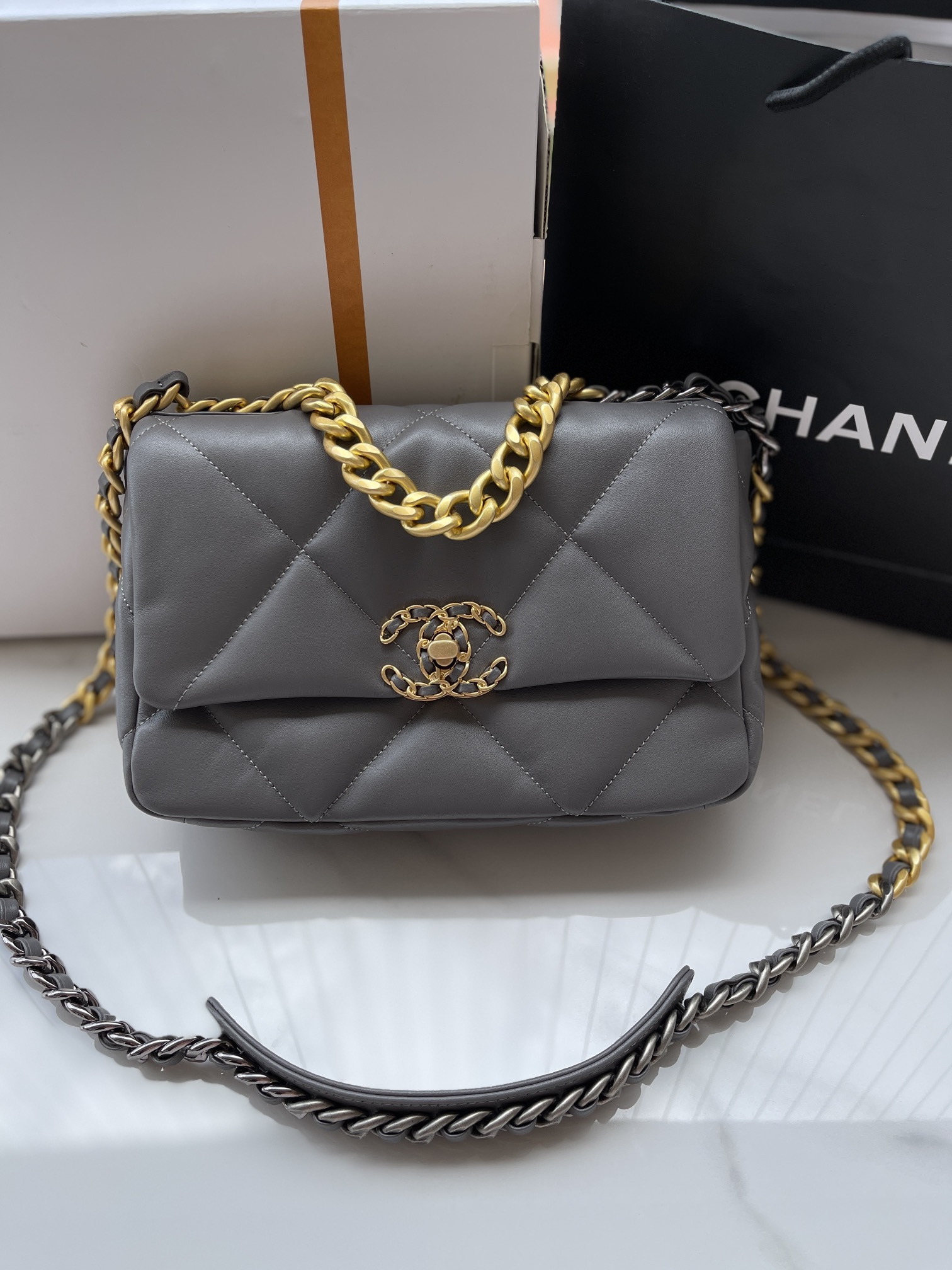 Ch**el 19 HANDBAG Shiny Leather, Gold-Tone, Silver-Tone & Ruthenium-Finish Metal Dark Gray 6.2 × 10.1 × 3.5 in