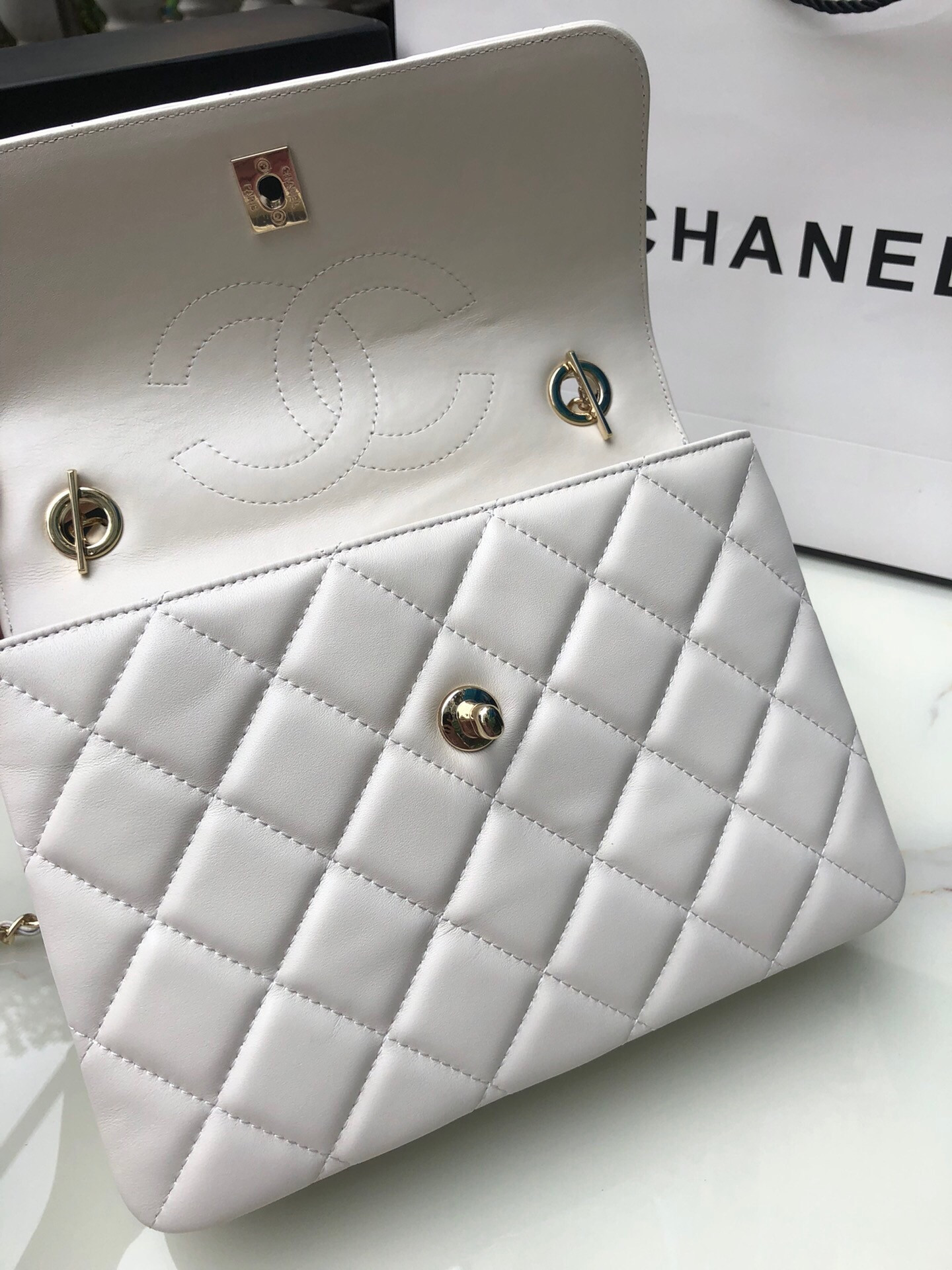 Ch**el FLAP BAG WITH TOP HANDLE 6.6 × 9.8 × 4.7 in