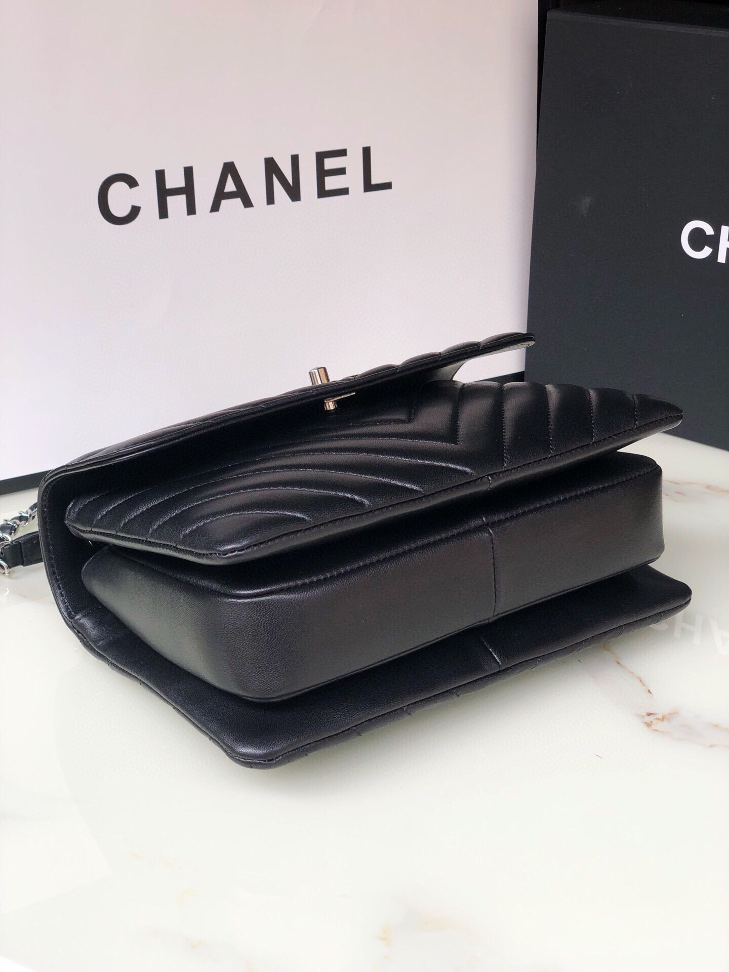 Ch**el FLAP BAG WITH TOP HANDLE 6.6 × 9.8 × 4.7 in