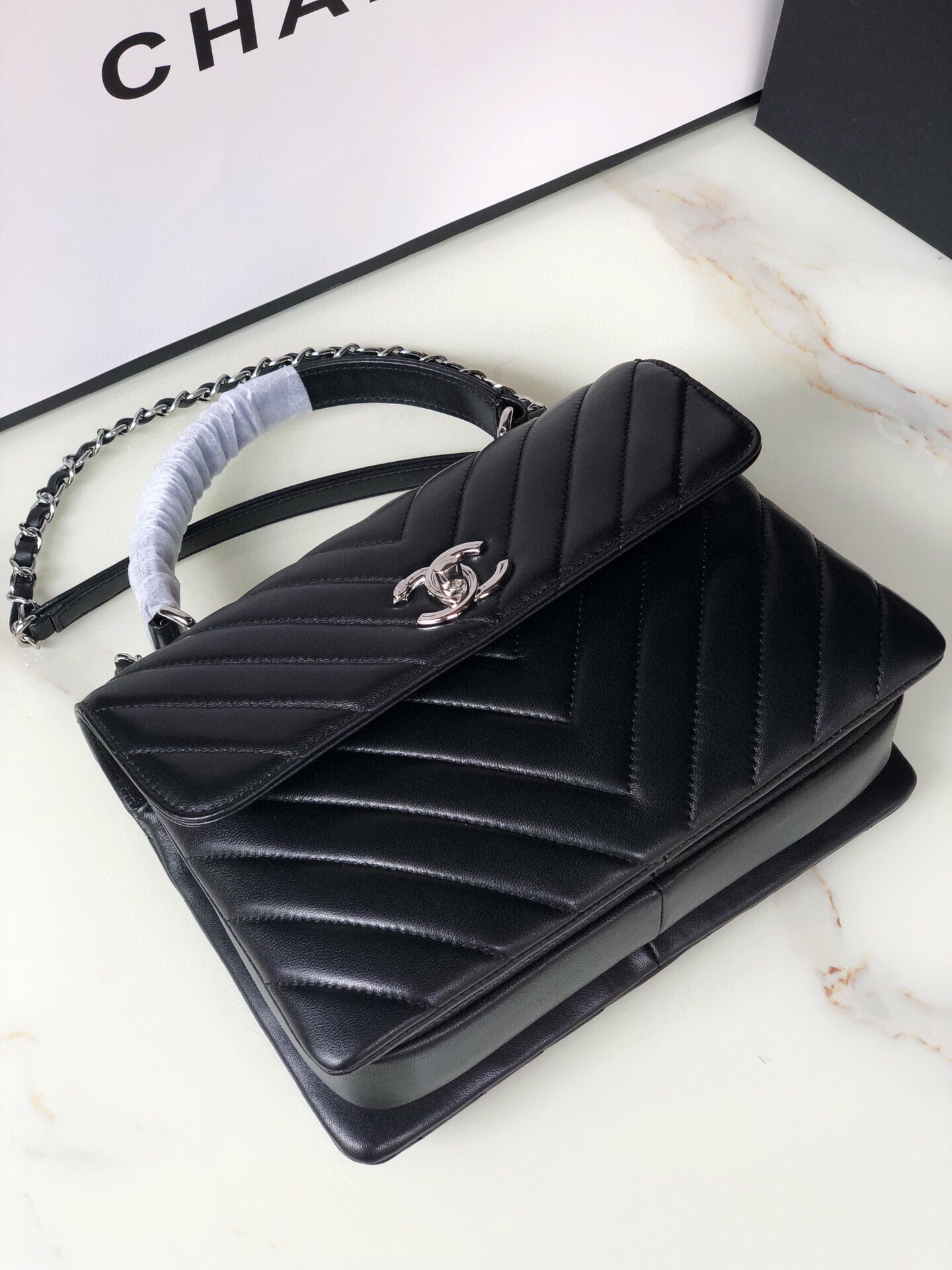 Ch**el FLAP BAG WITH TOP HANDLE 6.6 × 9.8 × 4.7 in