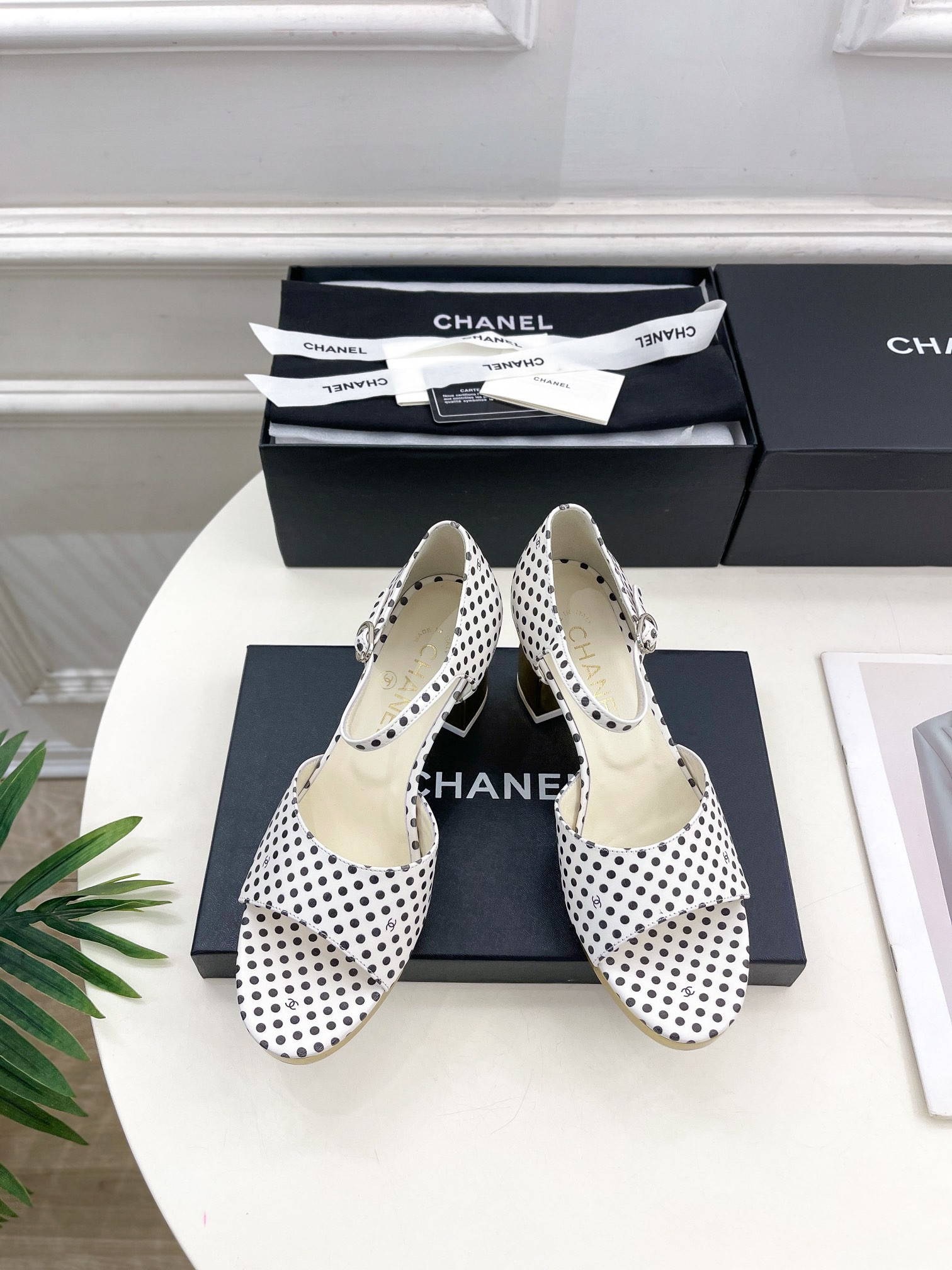 UA Ch**el HEELED SANDALS