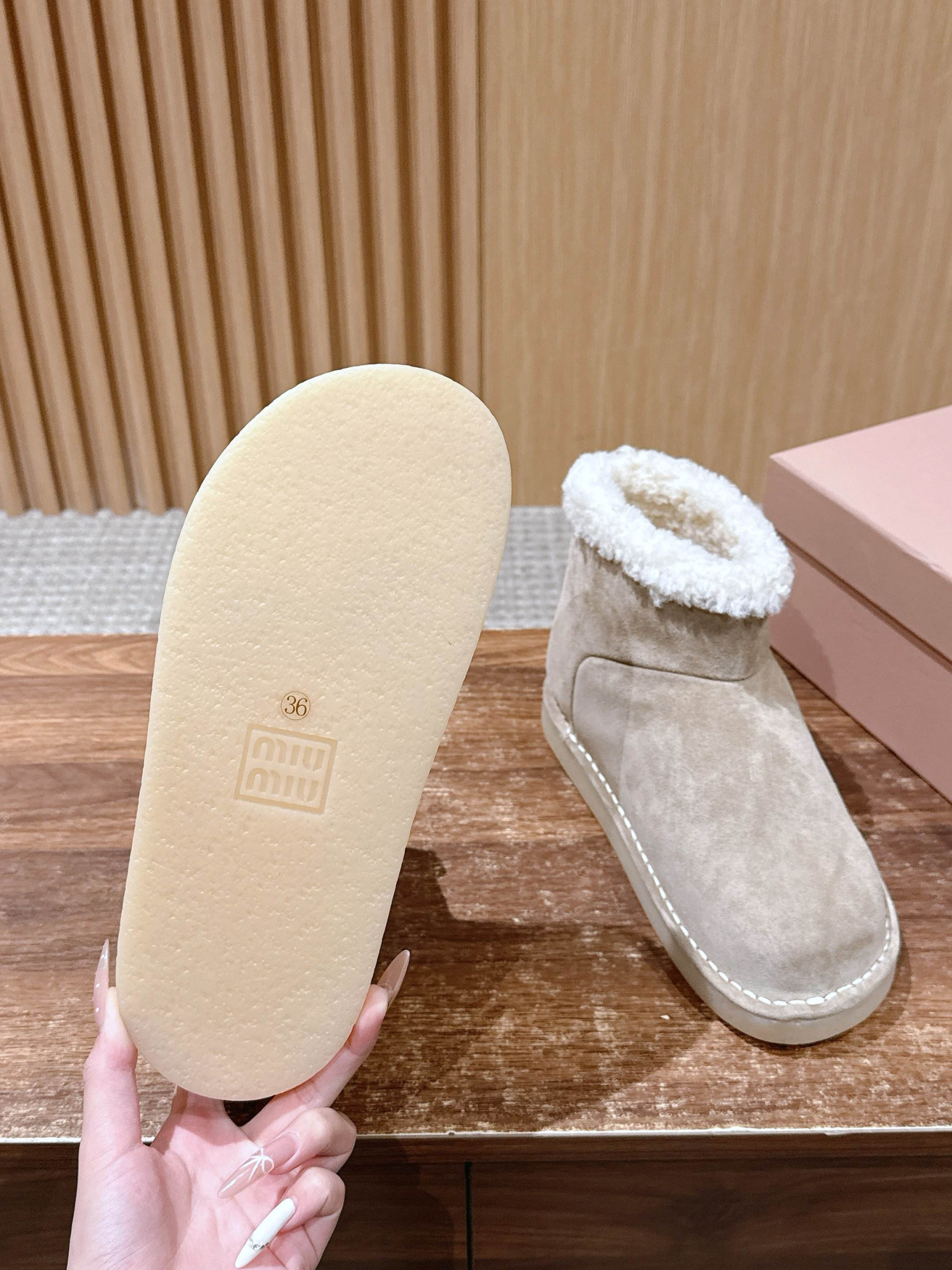 ua M1v M1v suede and shearling booties