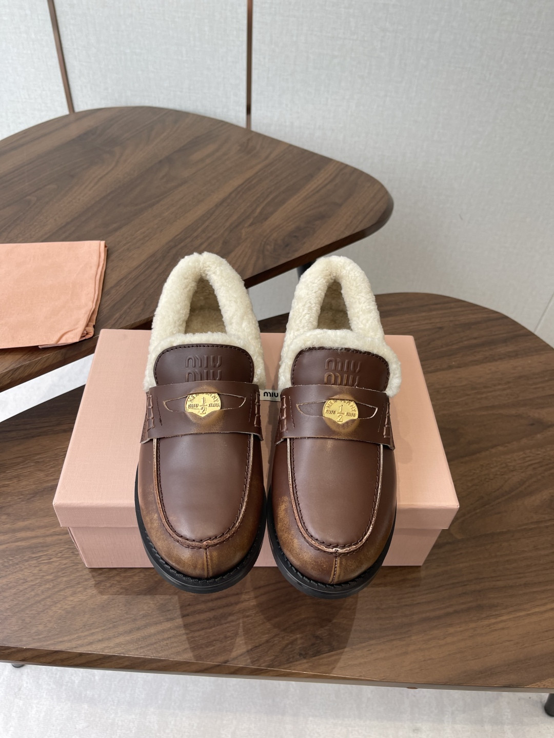 ua M1v M1v bleached leather and shearling penny loafers