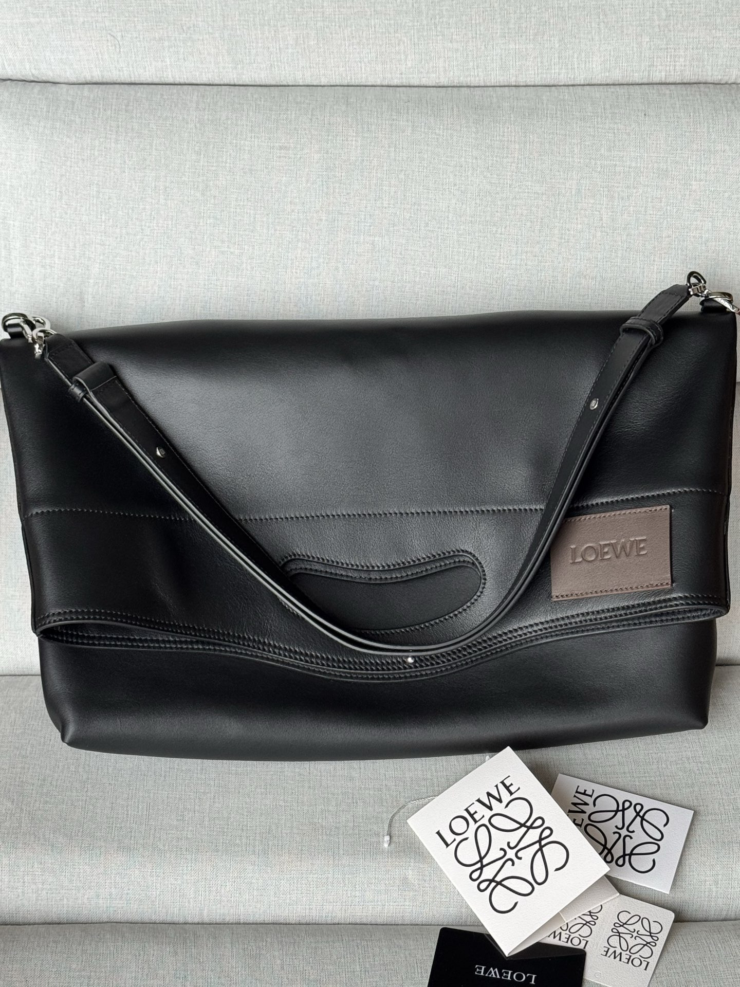 l0ew* bob folded tote in shiny S*pple calfskin